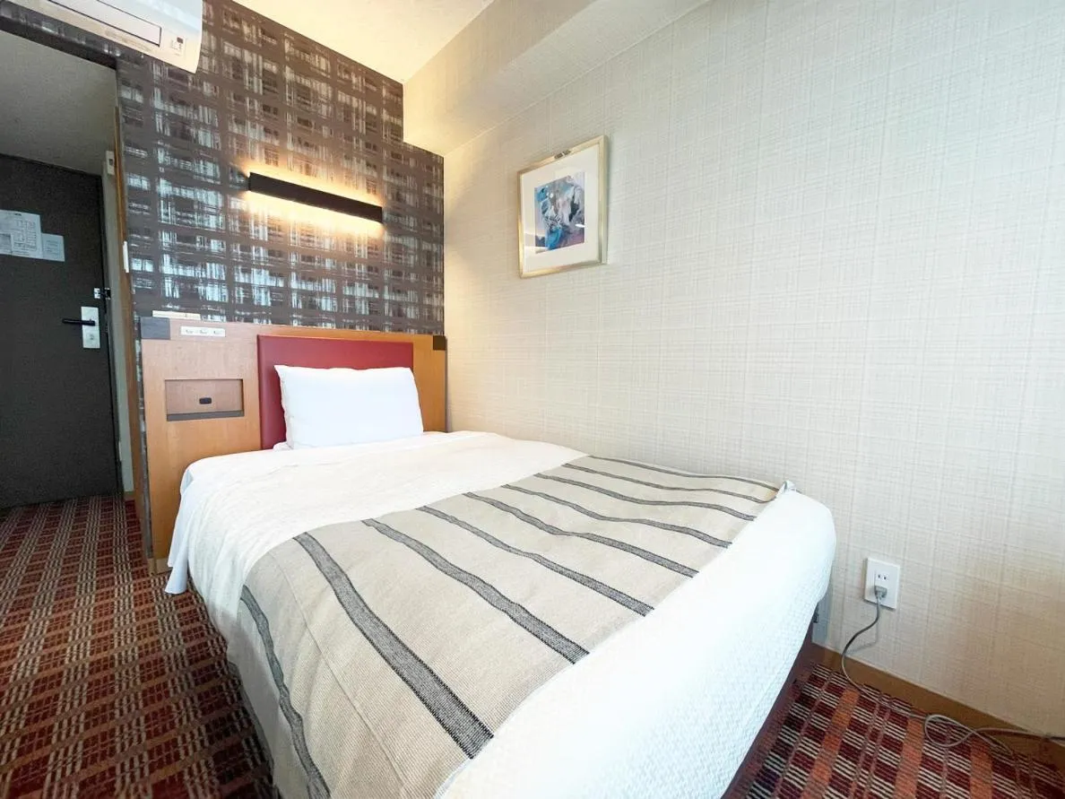 Bed in Garden Hotel Shizuoka