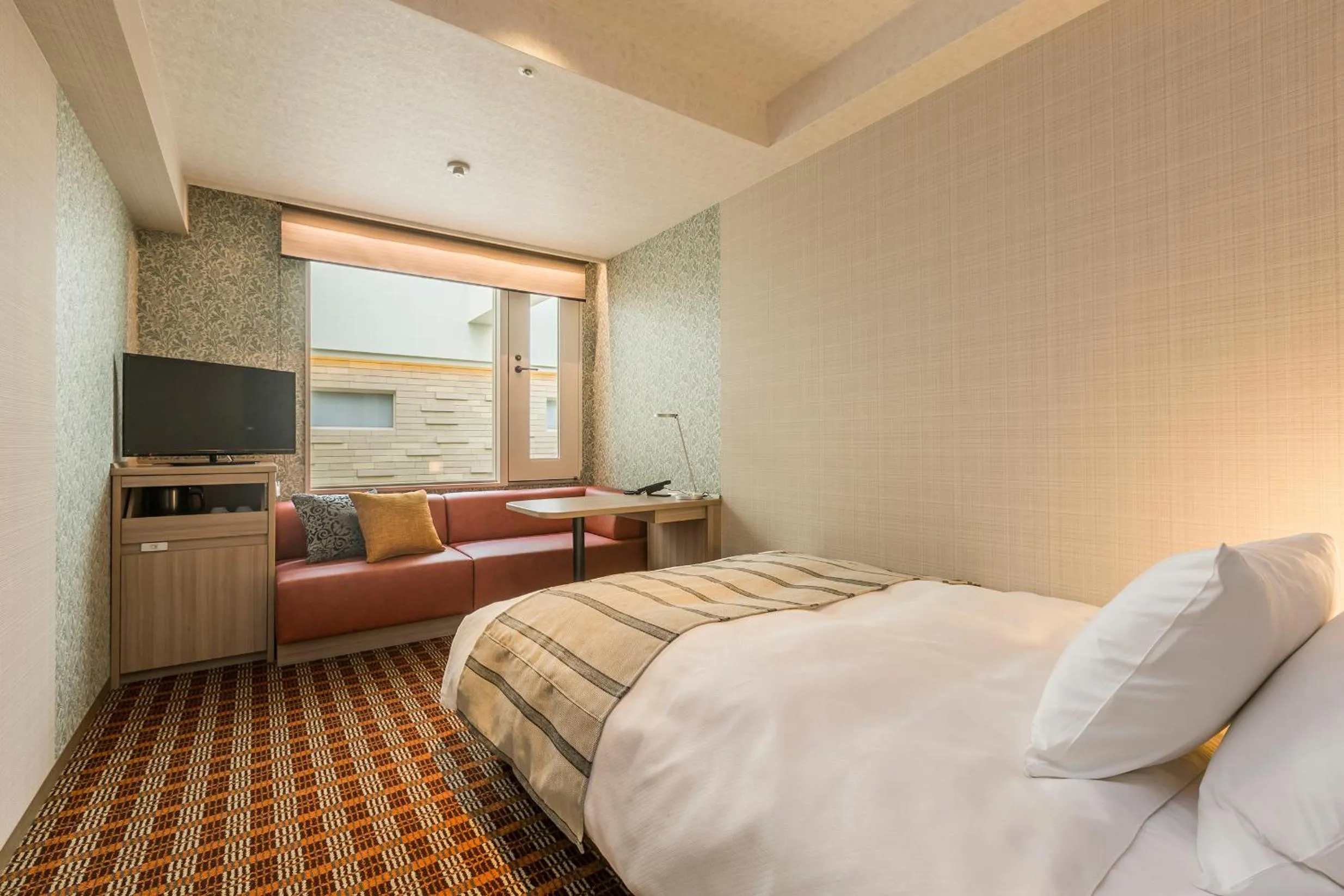 Bed in Garden Hotel Shizuoka