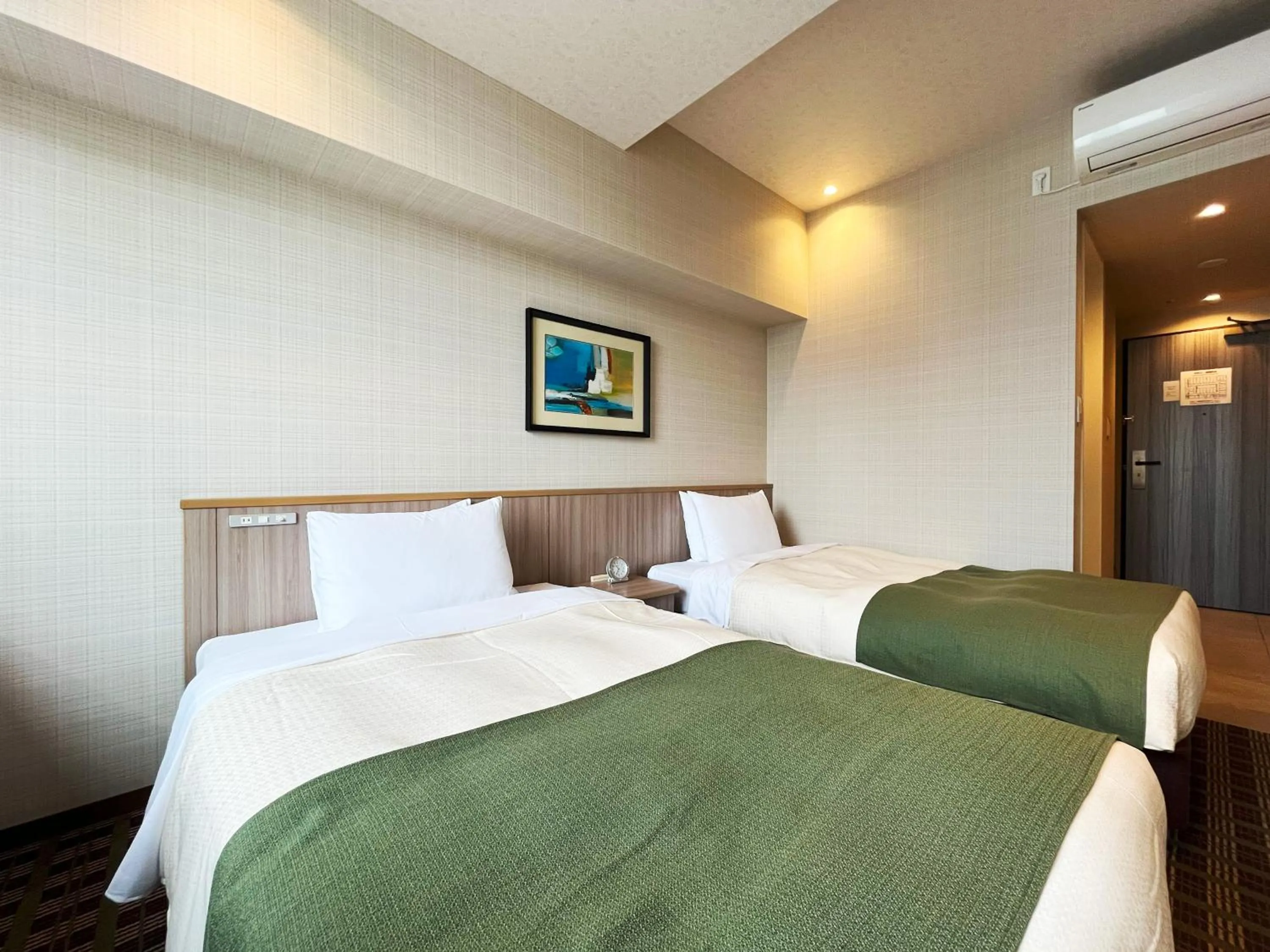 Bed in Garden Hotel Shizuoka