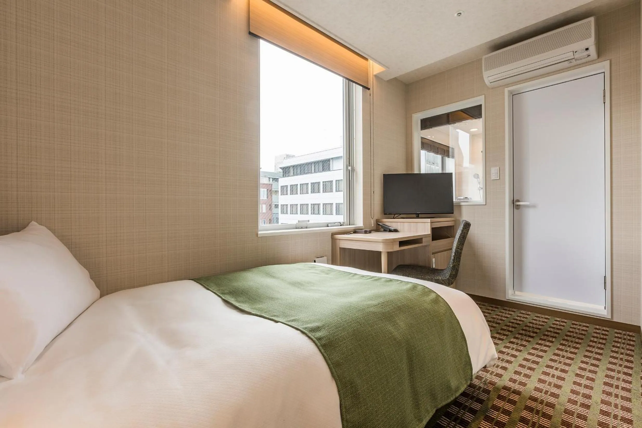 Bed in Garden Hotel Shizuoka