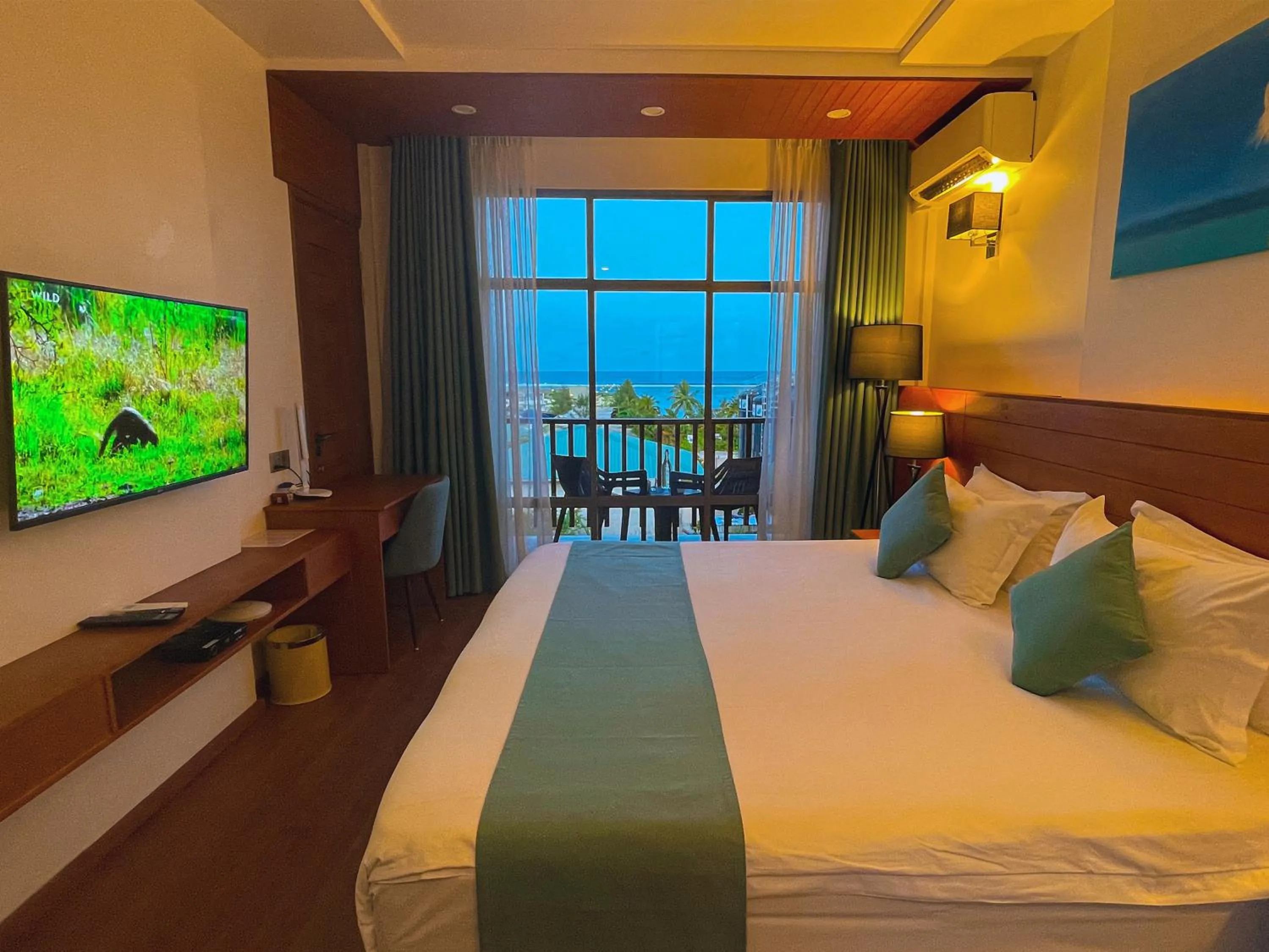 Bed in Araamu Hotels Maldives at Dhiffushi