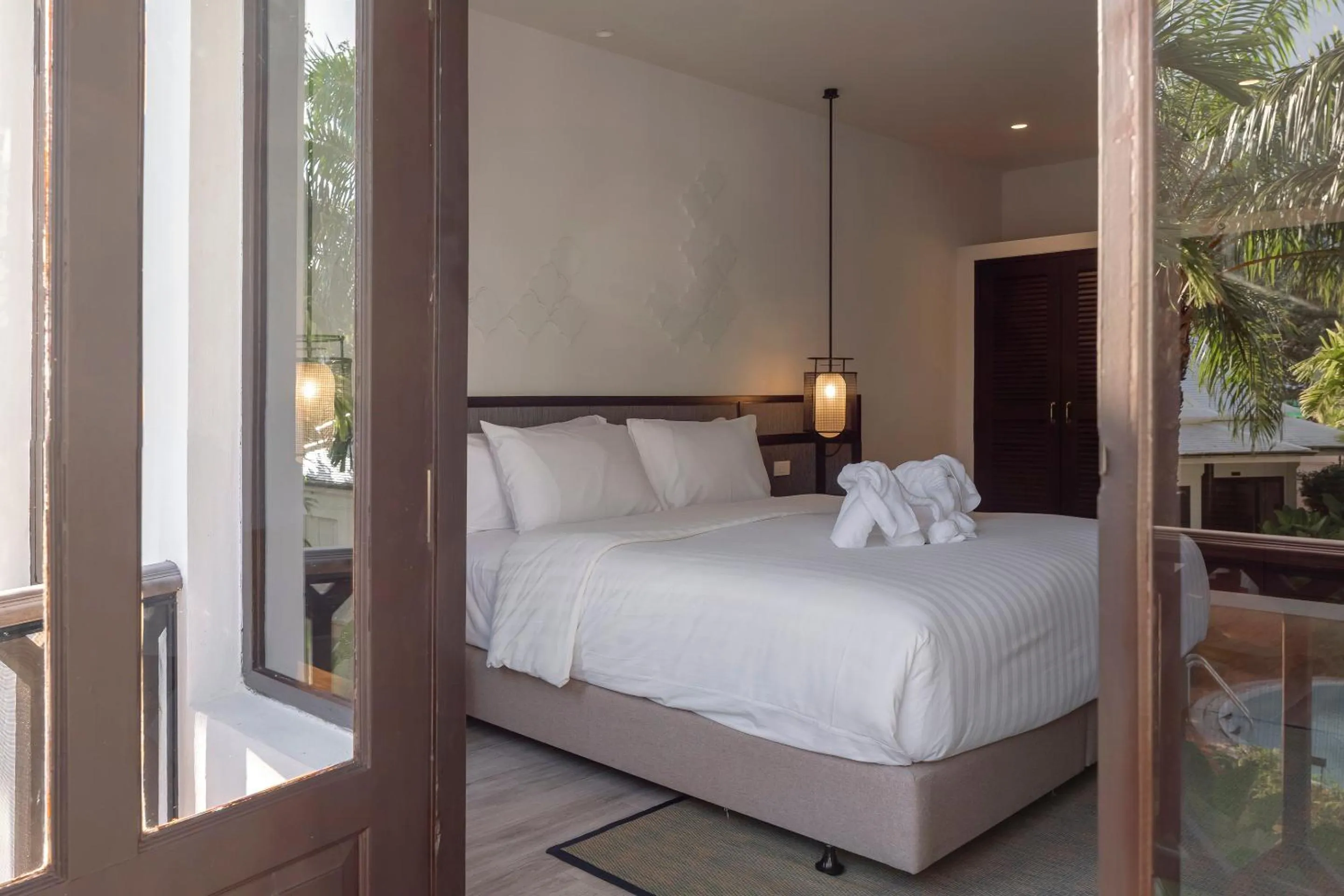 Bed in The Pe La Resort, Phuket - SHA Extra Plus