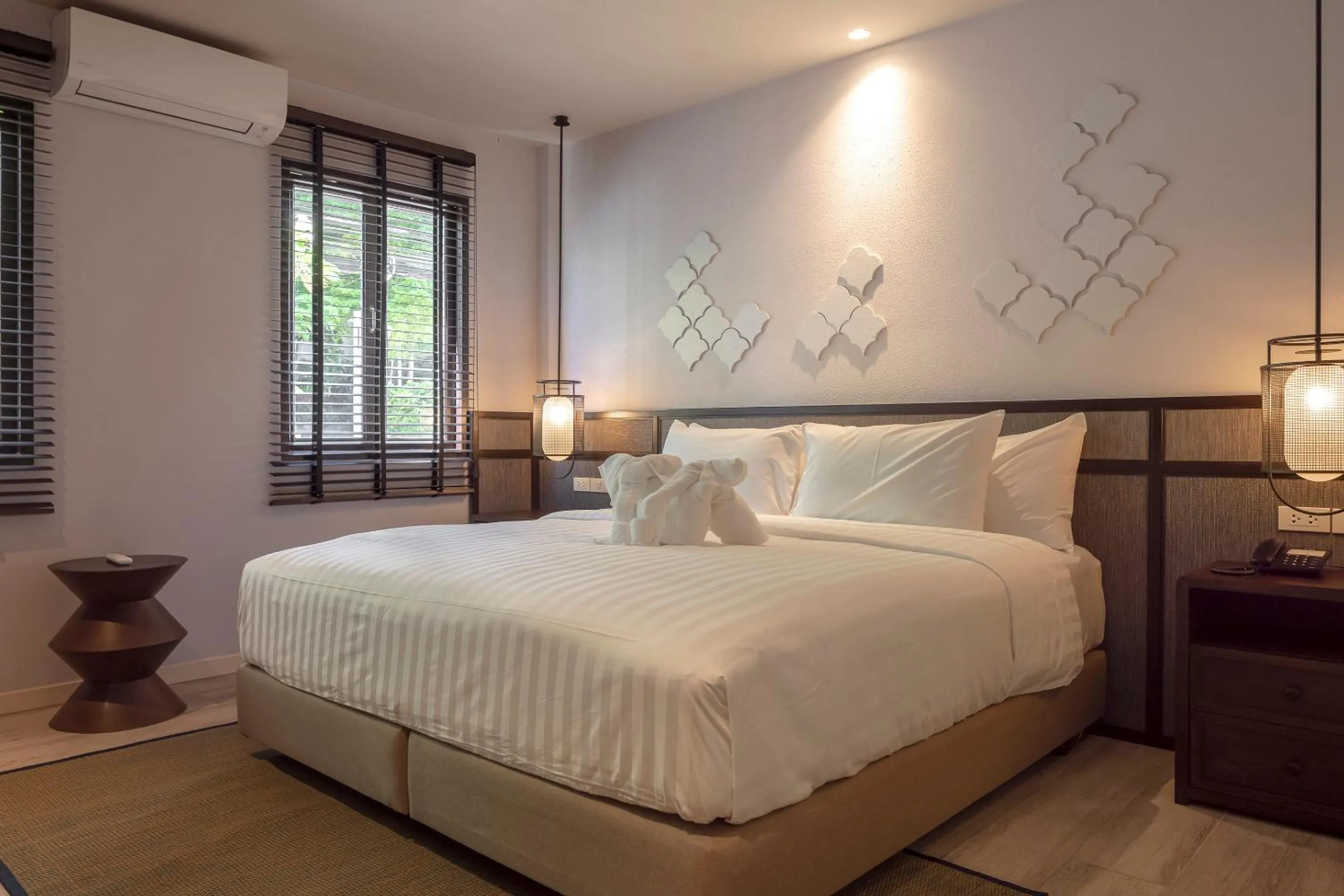 Bed in The Pe La Resort, Phuket - SHA Extra Plus