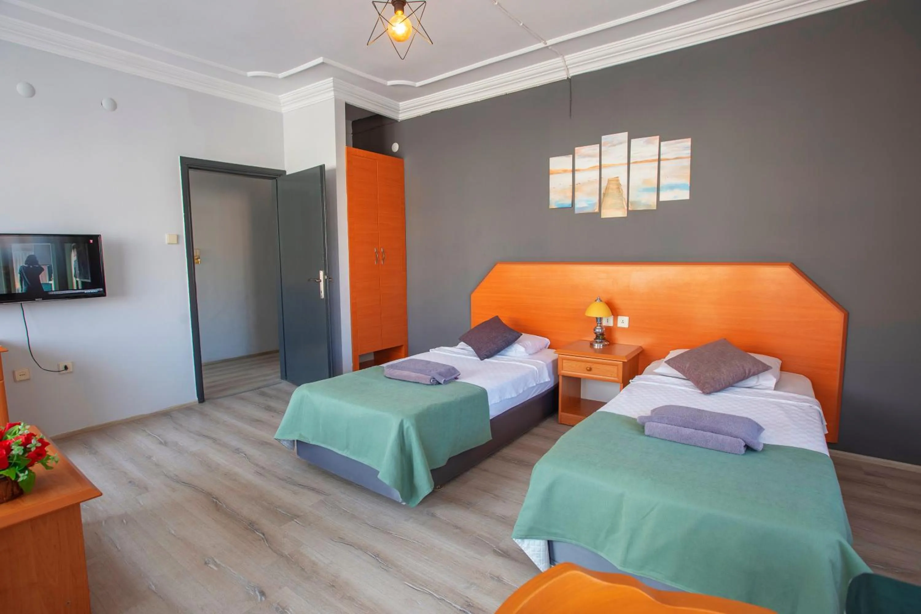 Bed in HMA Hotel & Suites