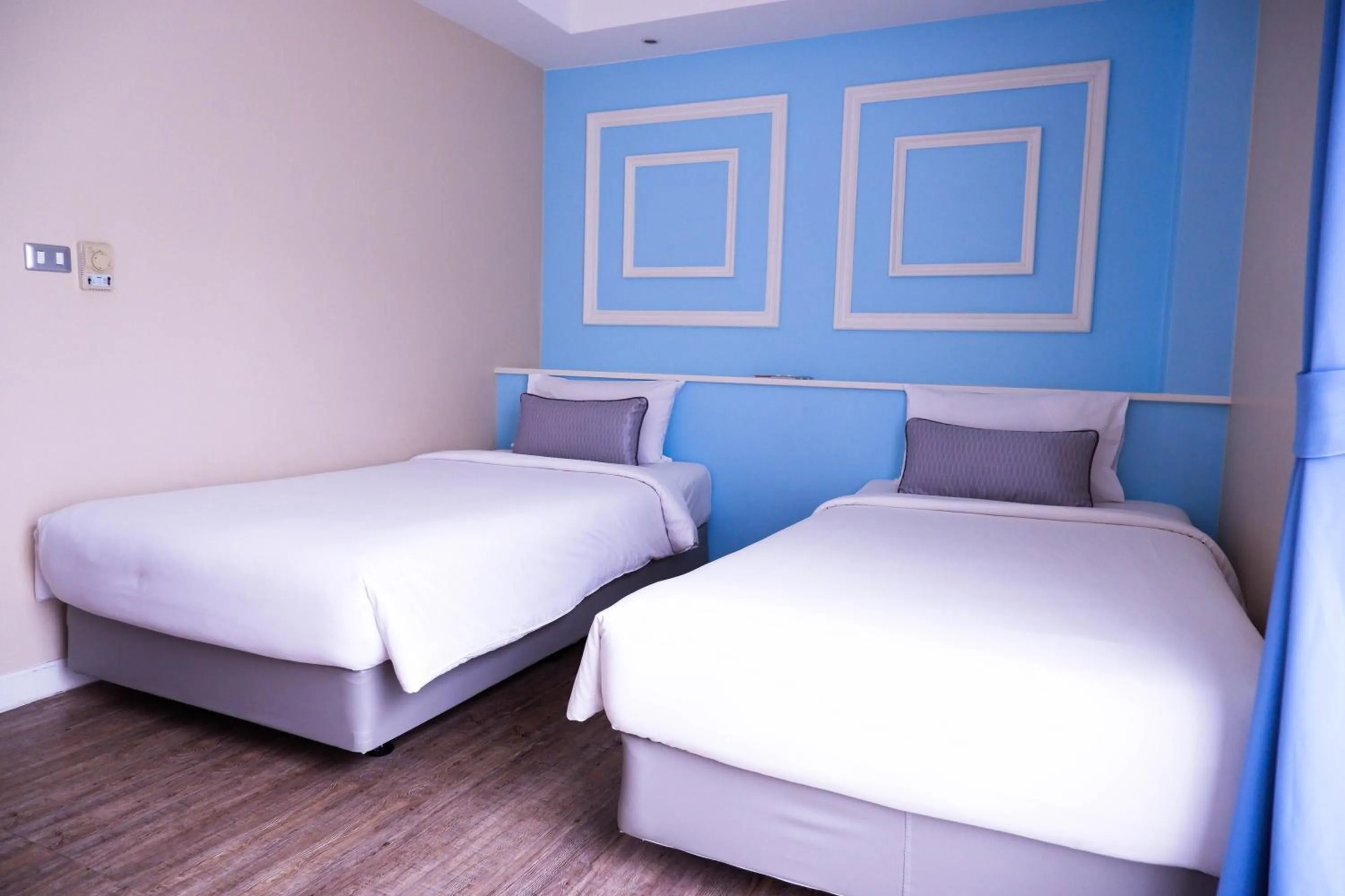 Bed in The Beach Boutique House