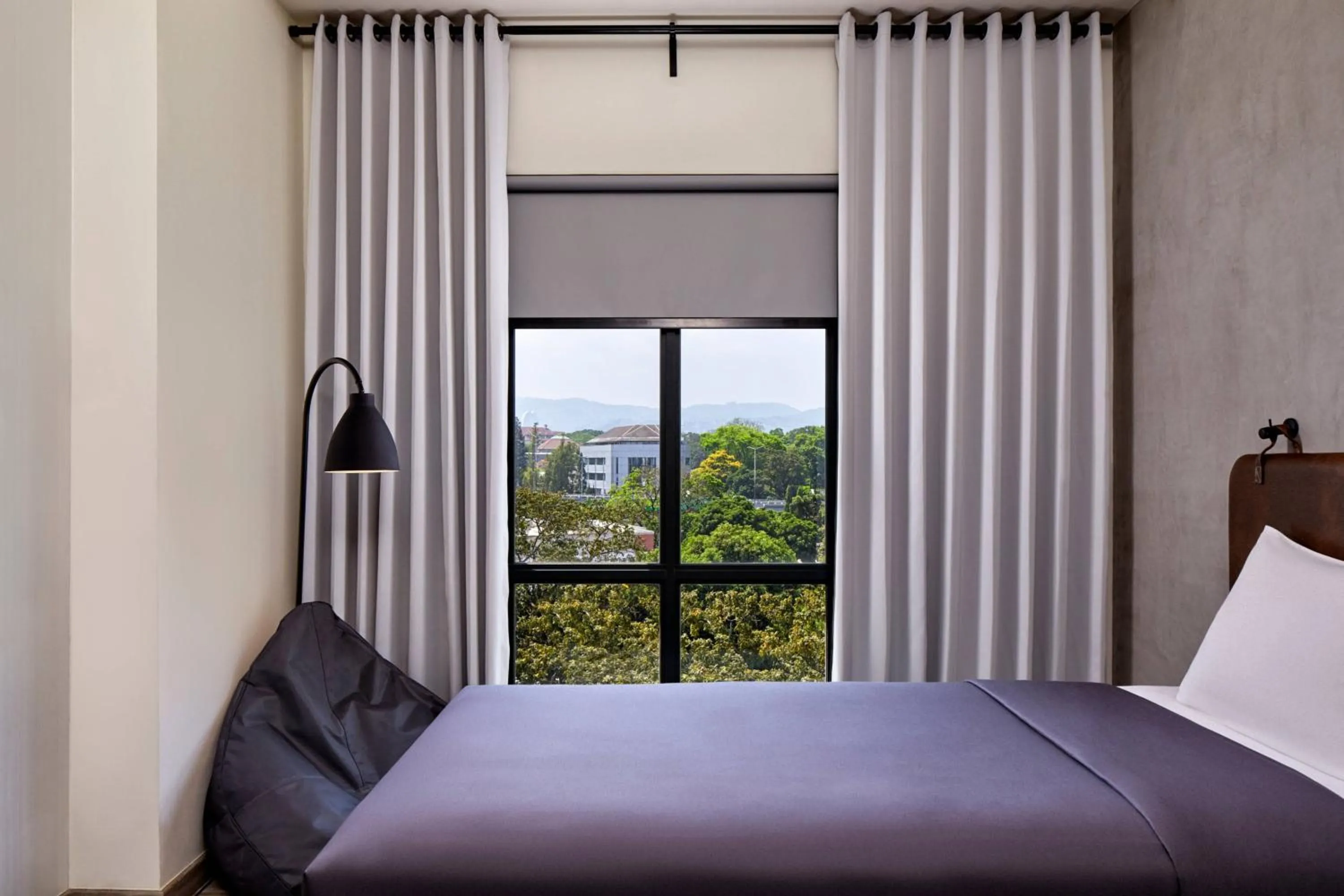 Photo of the whole room, Bed in MOXY Bandung