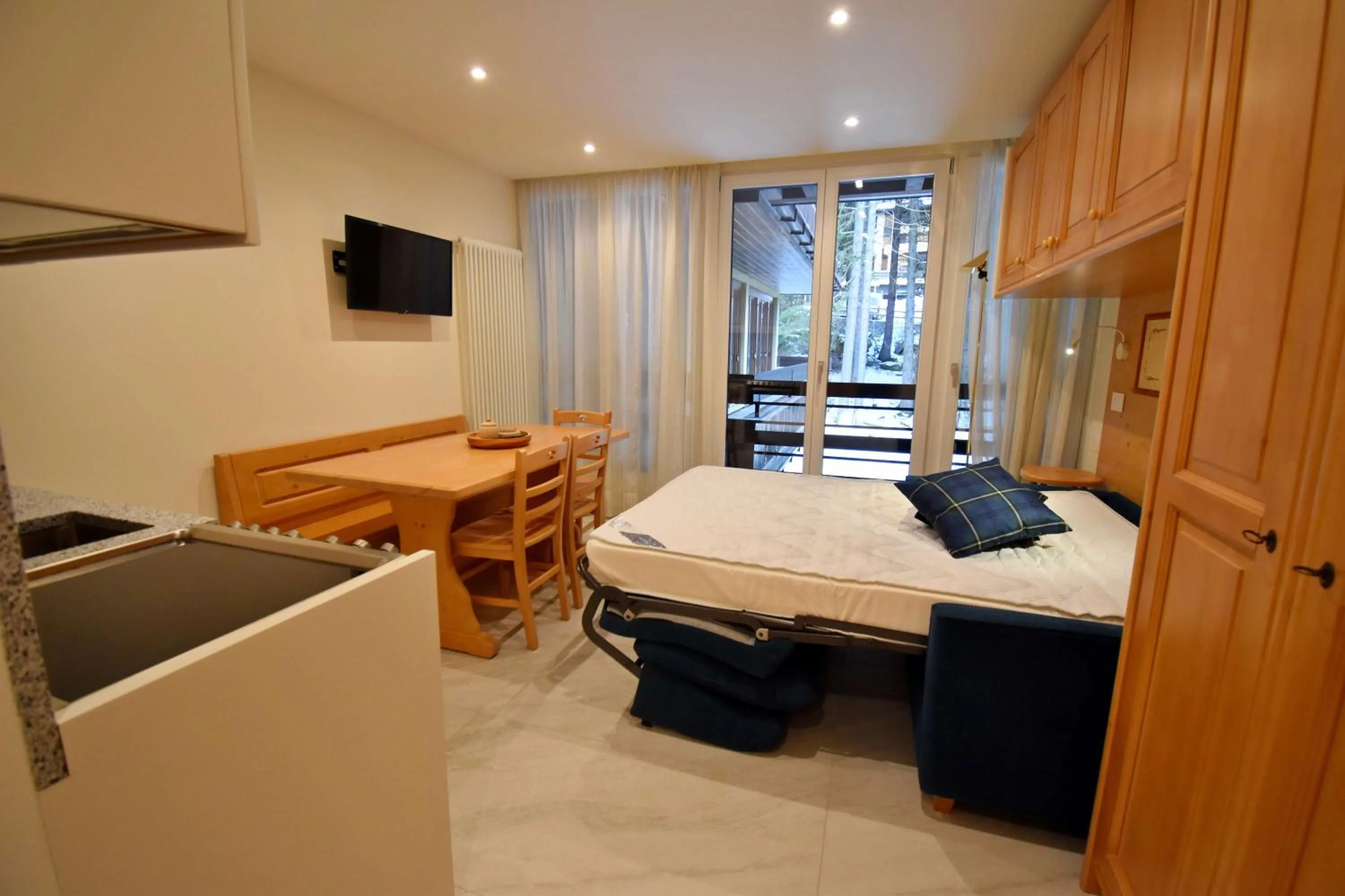 Living room, Bed in Residenza Silvana