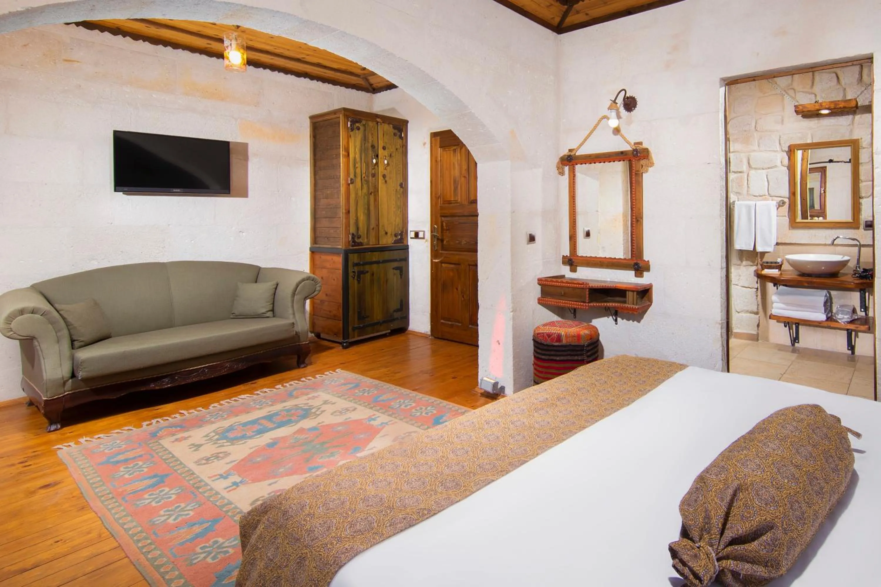Living room, Bed in Aja Cappadocia Cave Hotel