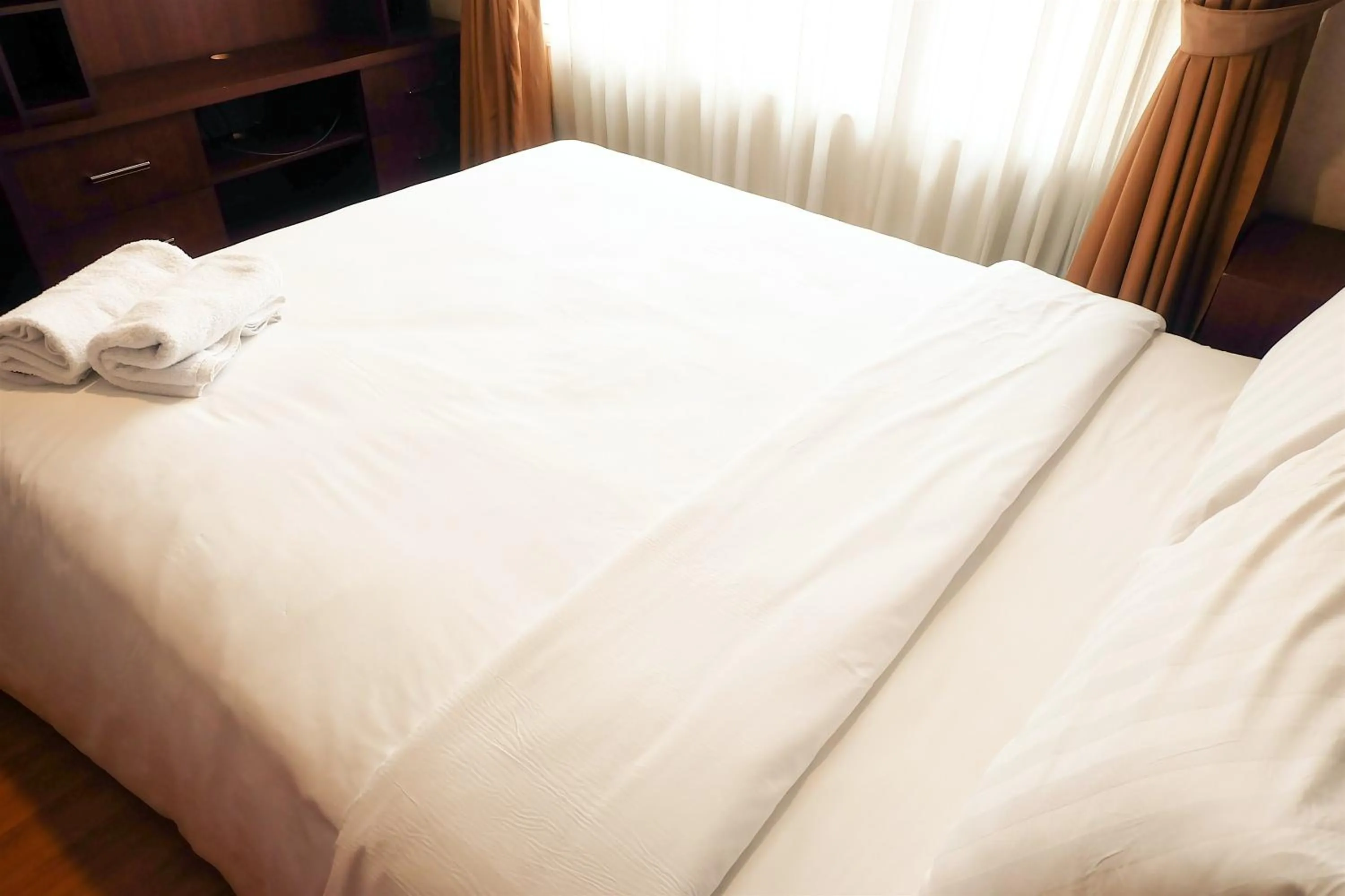 Apartment in 2BR Prestige Essence Dharmawangsa Apartment By Travelio