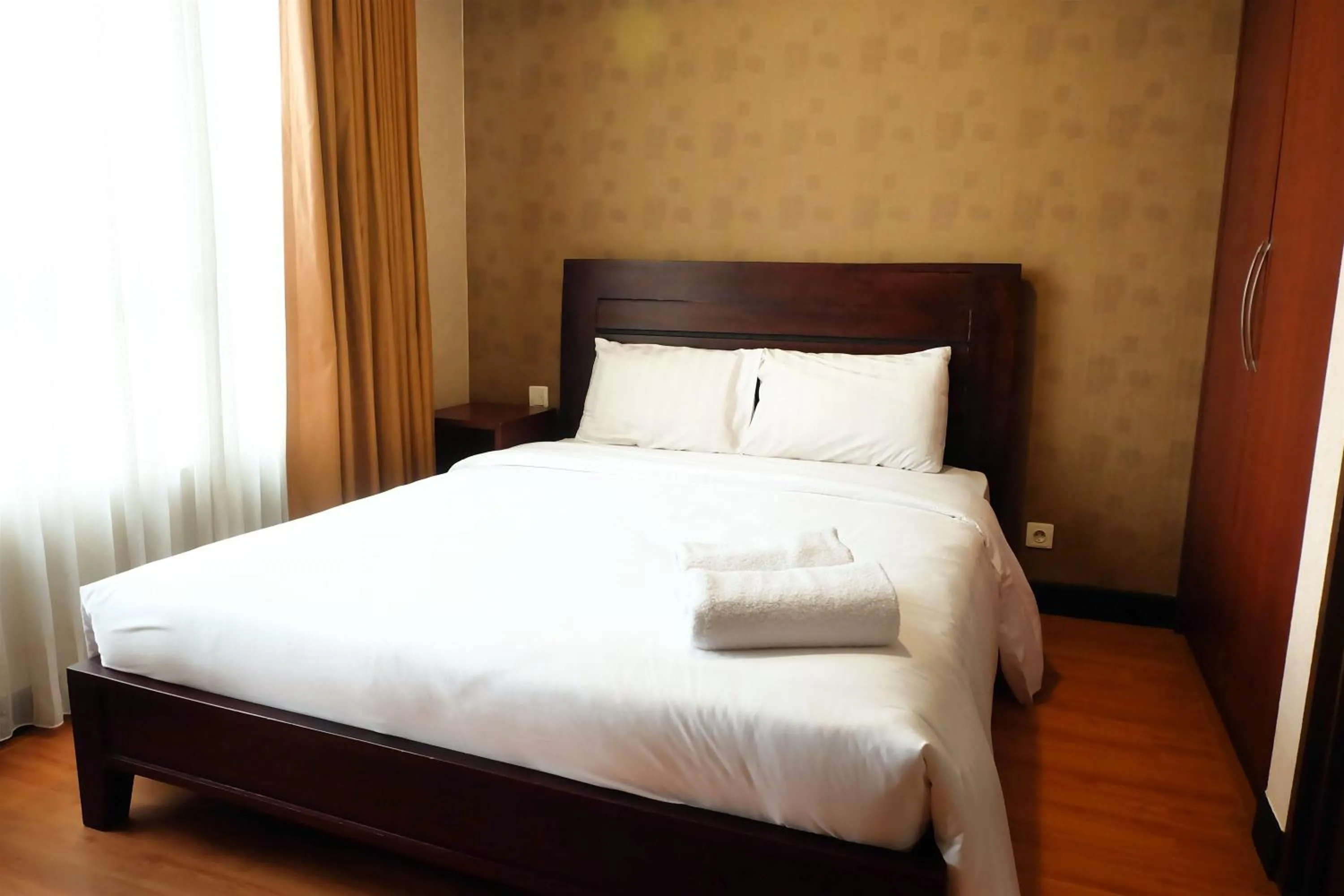 Apartment in 2BR Prestige Essence Dharmawangsa Apartment By Travelio