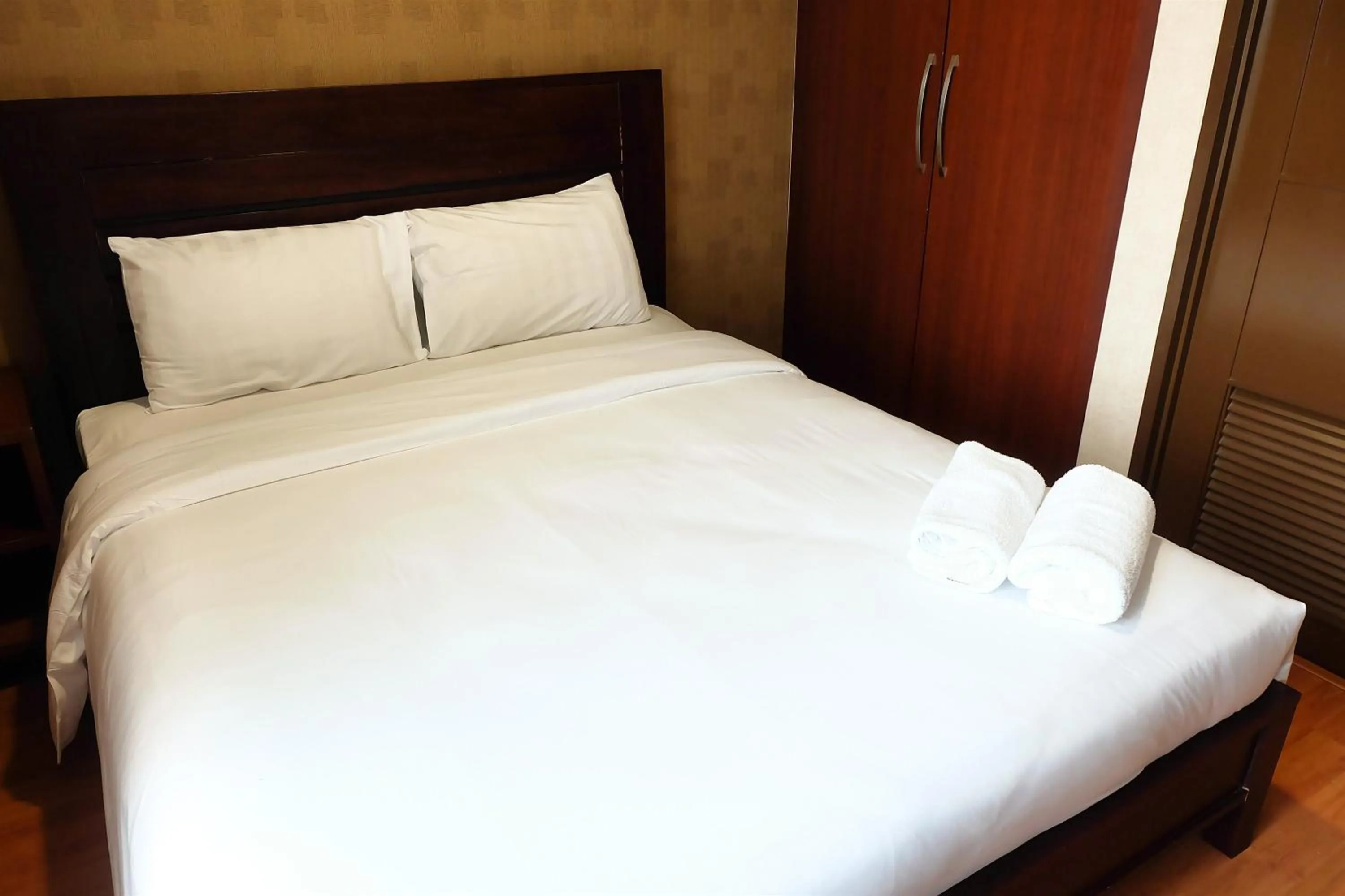 Apartment in 2BR Prestige Essence Dharmawangsa Apartment By Travelio