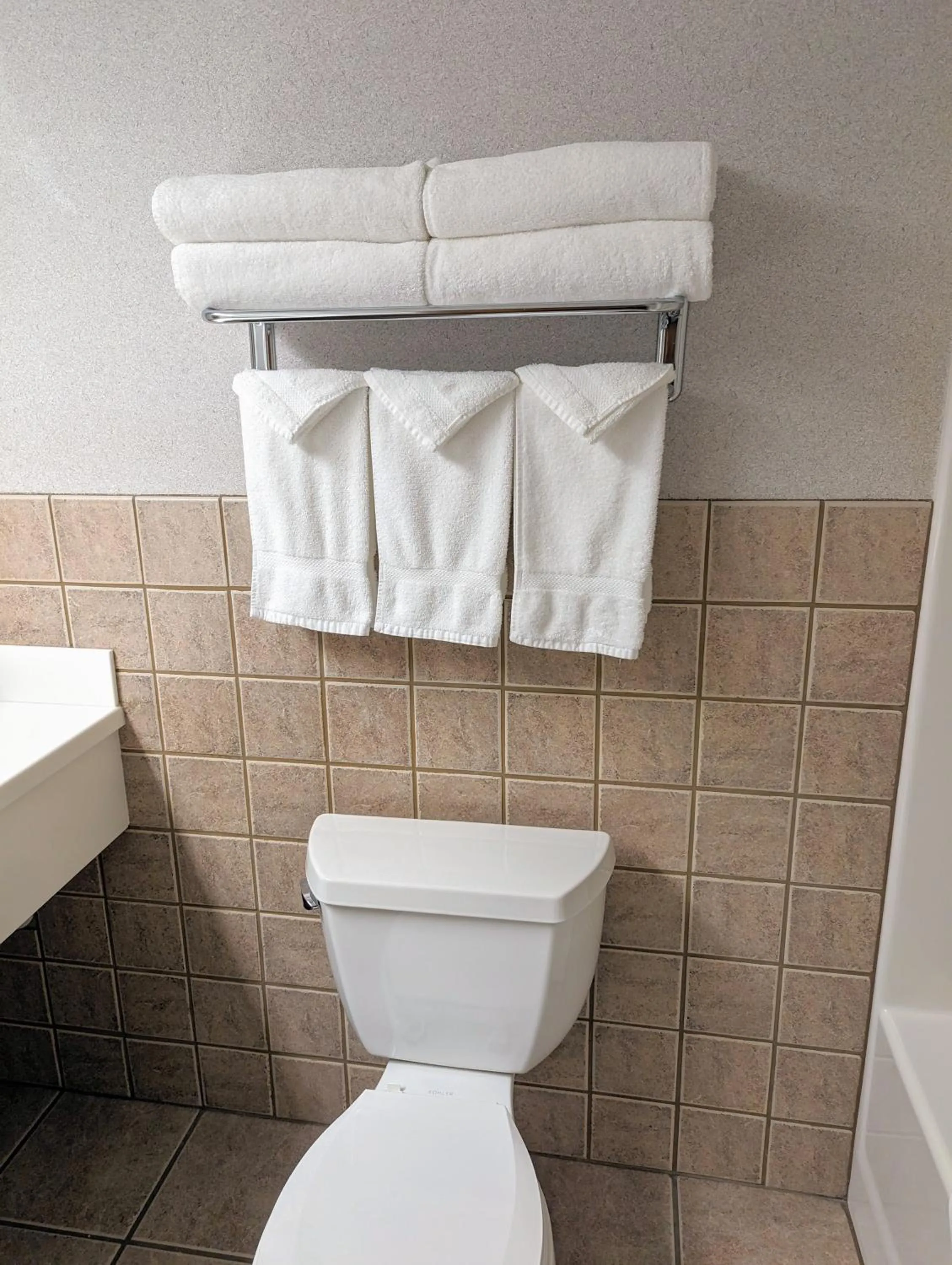 Toilet in Travelodge by Wyndham Deadwood