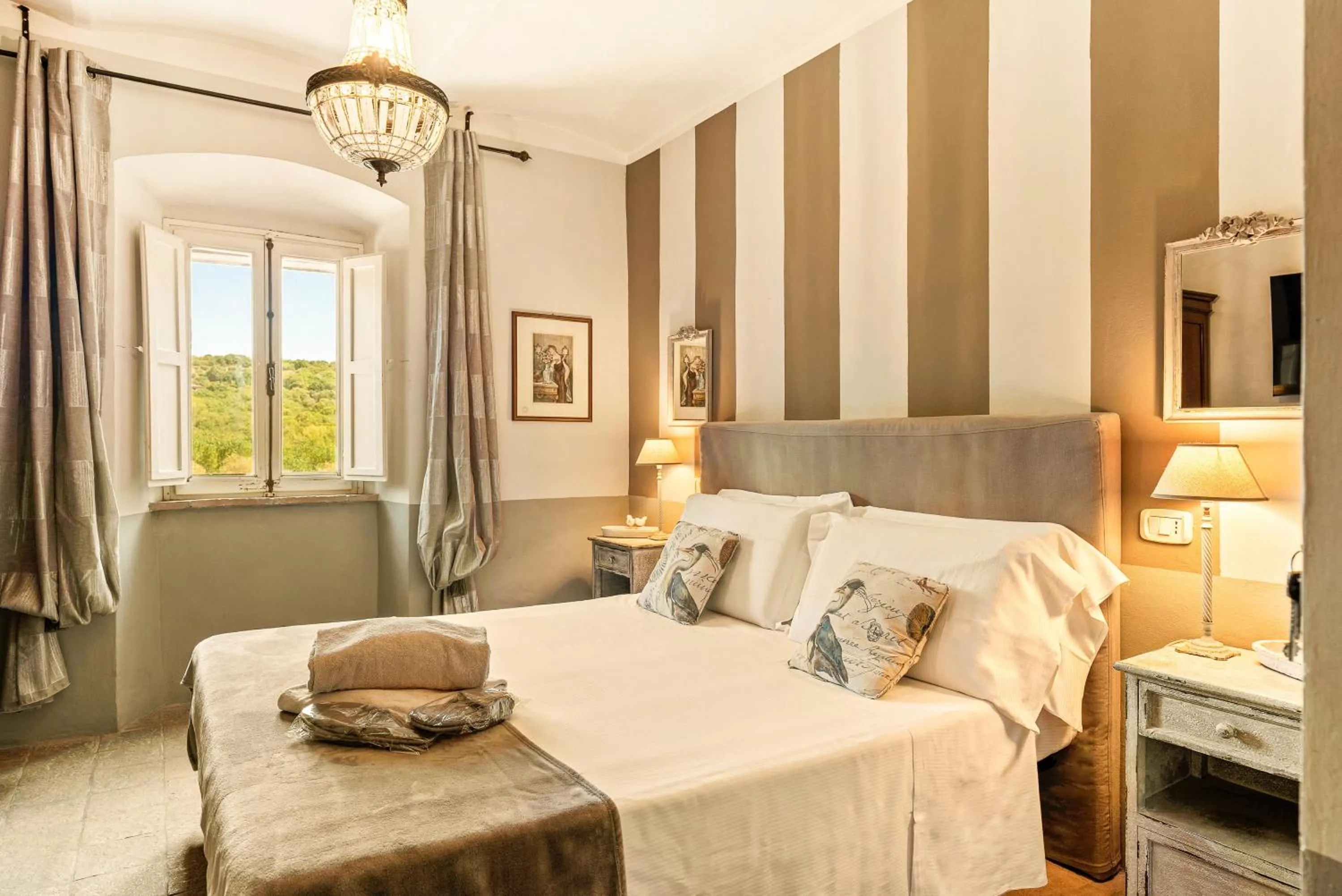 Bedroom, Bed in I Capricci Di Merion - Resort & Spa