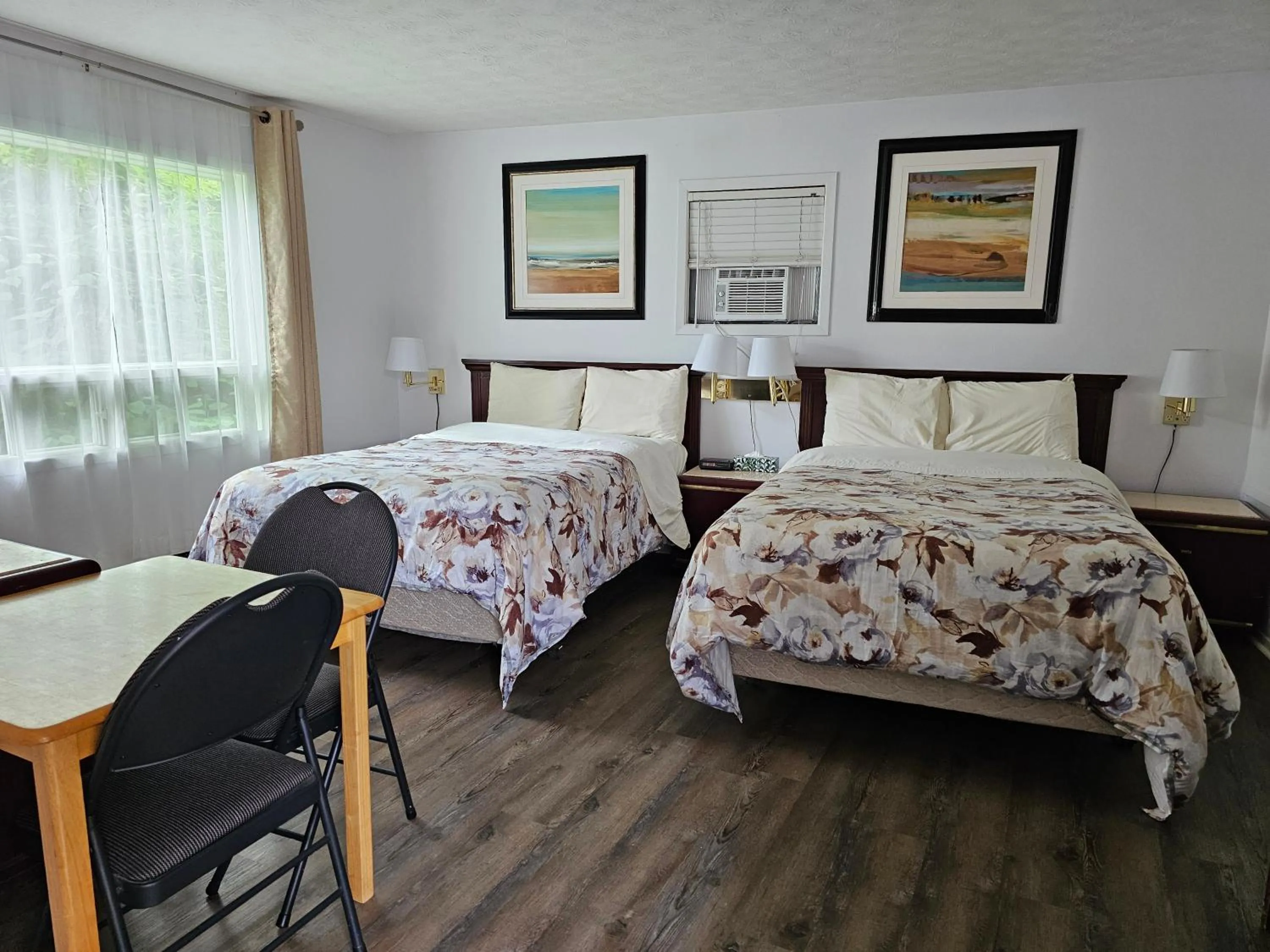 Bed in Motel de l'Outlet