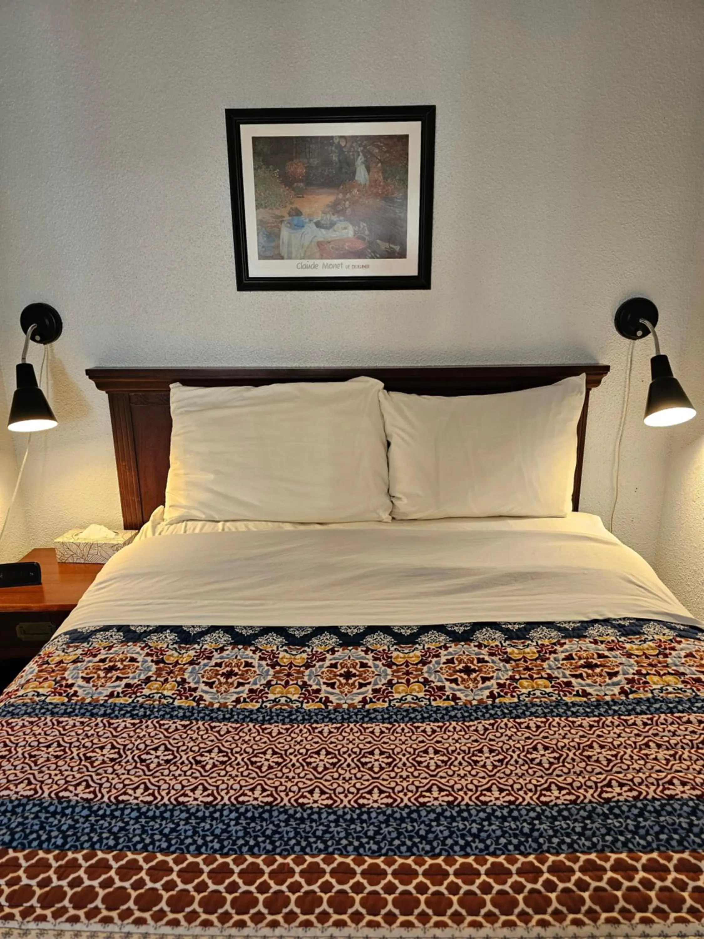 Bed in Motel de l'Outlet