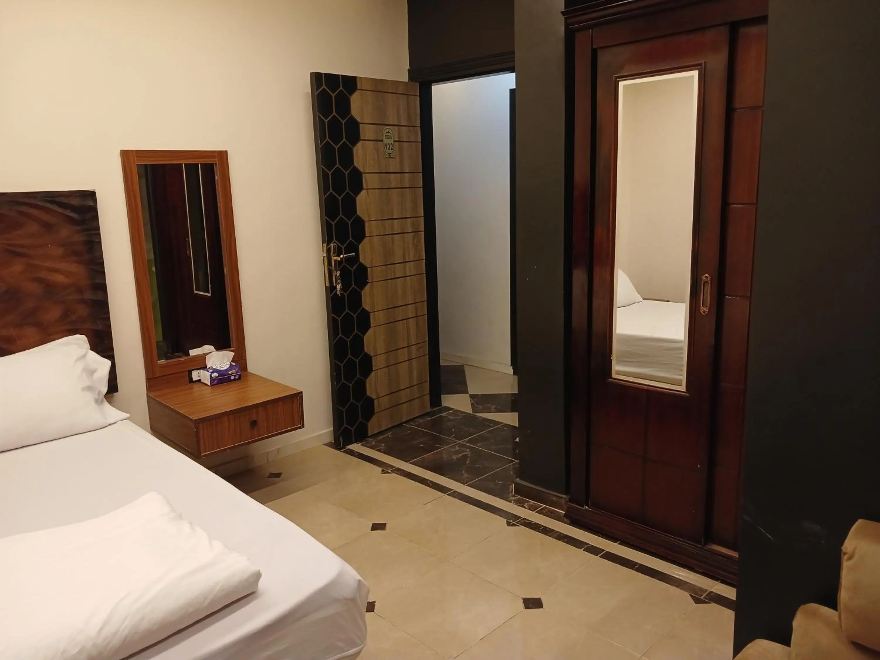 Bed in Royal Pyramids Inn