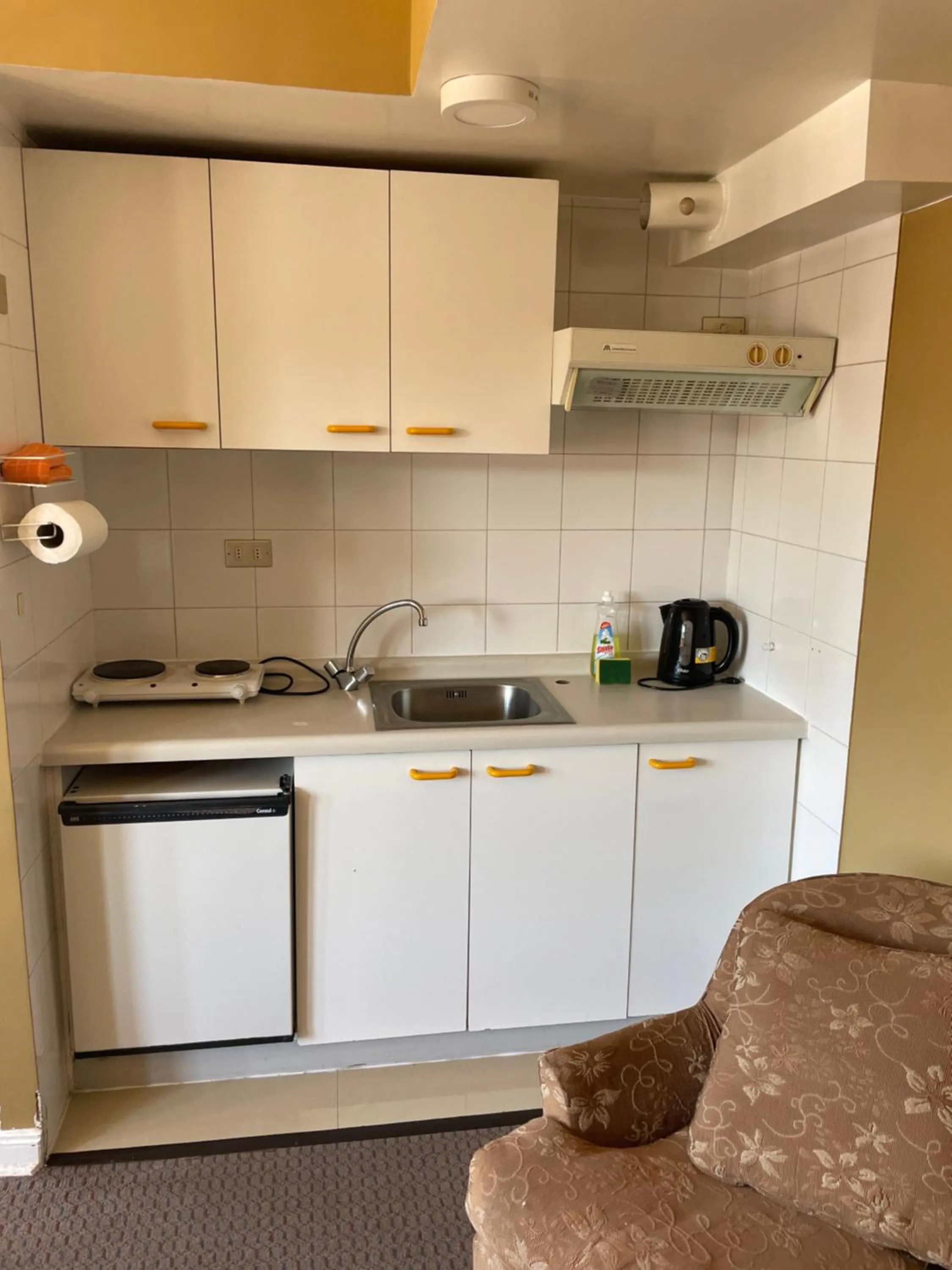 kitchen in Hotel Apart Colón