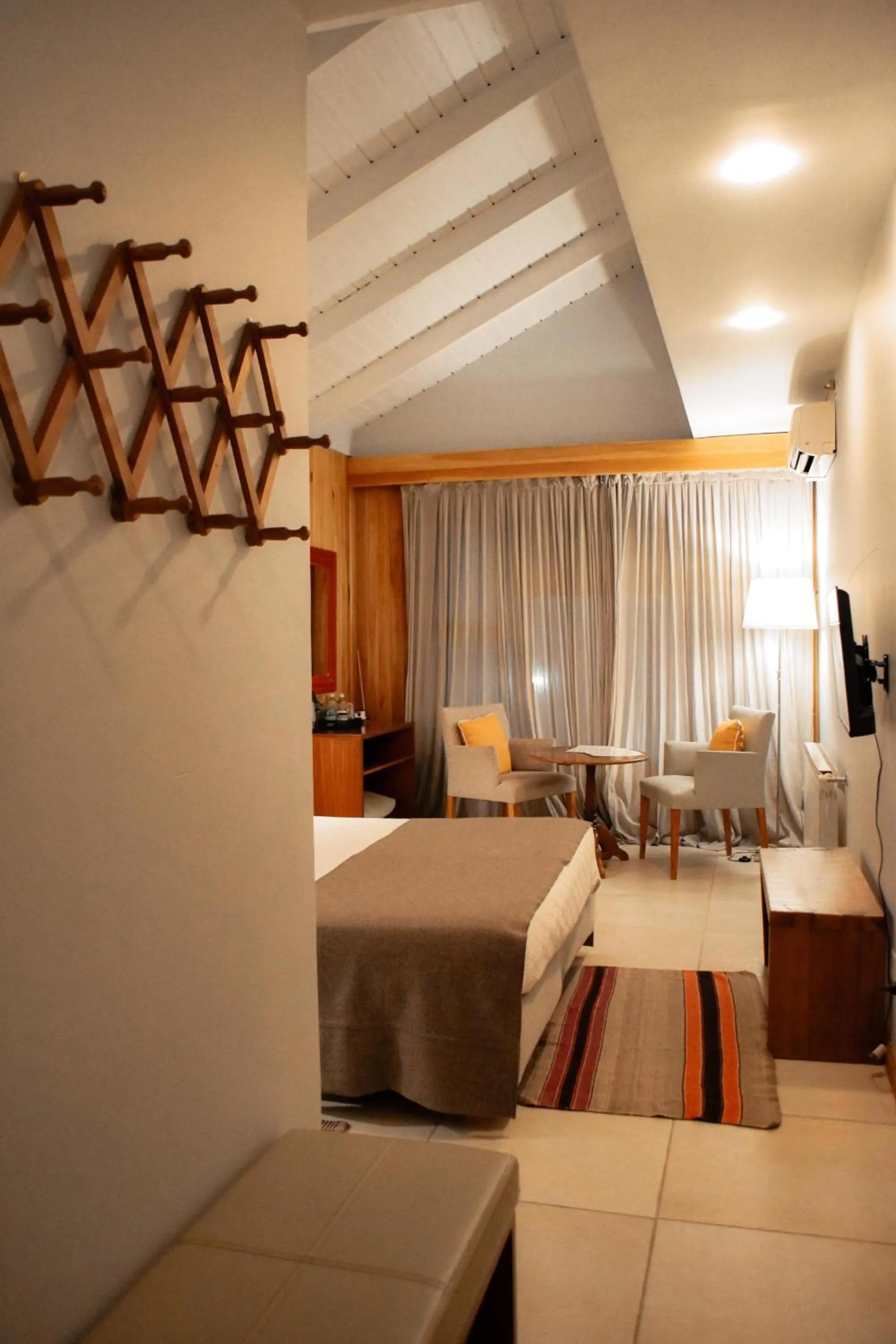 Bed in Las Bayas Home Suites