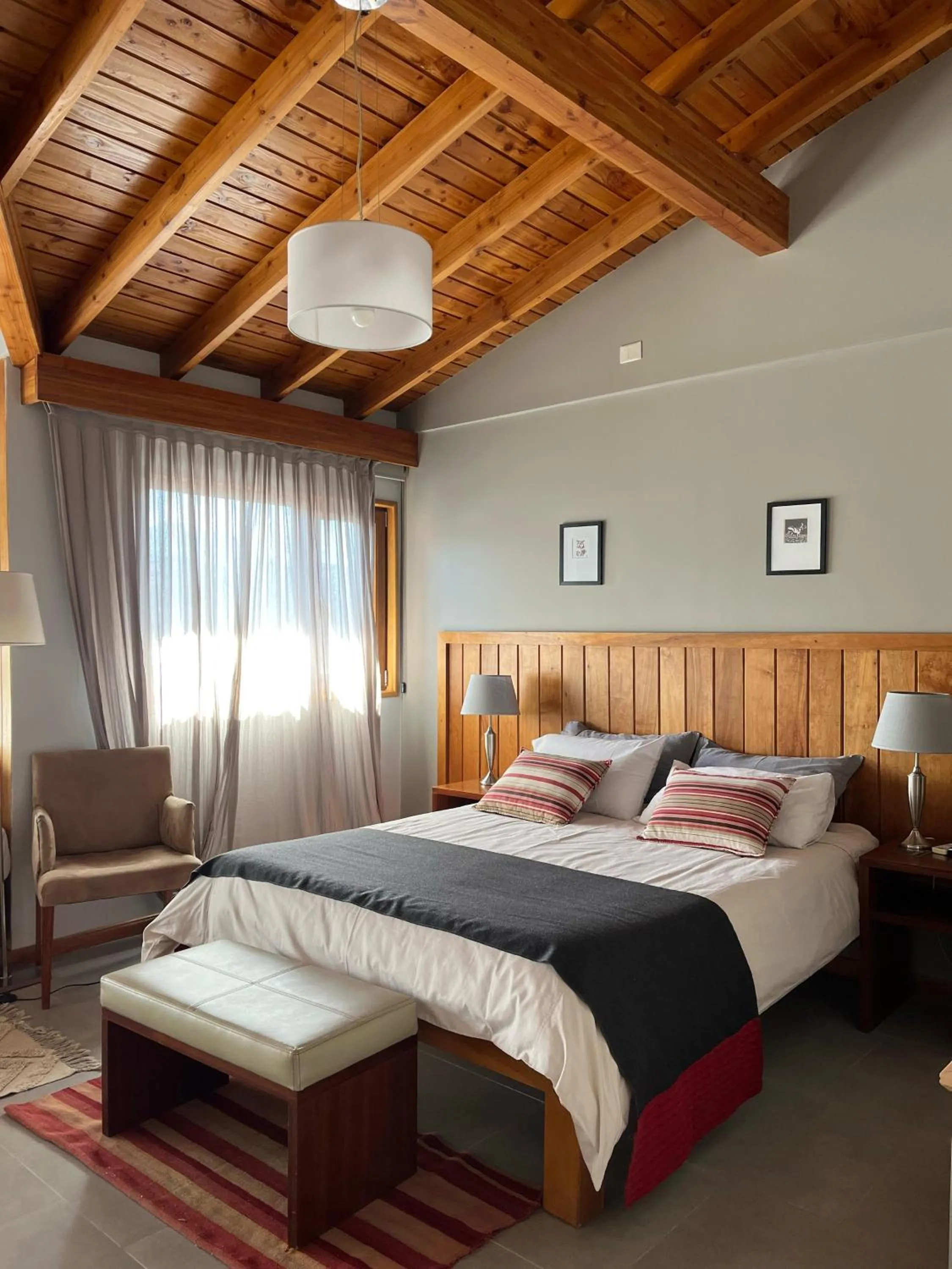 Bed in Las Bayas Home Suites