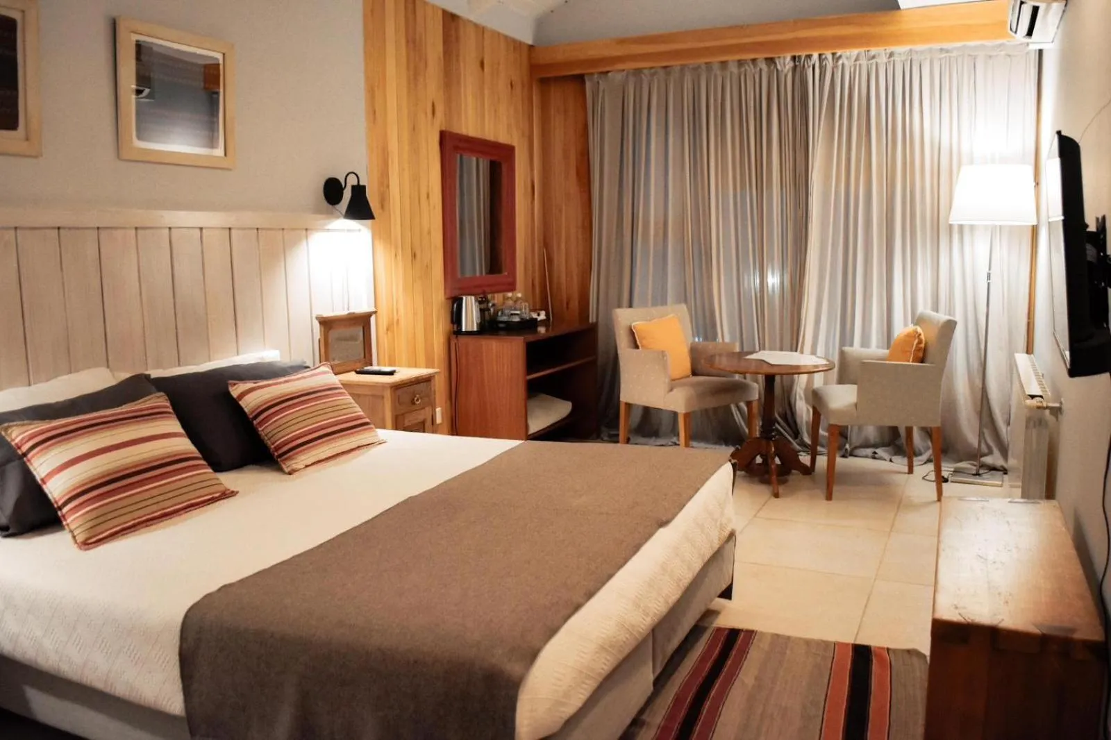 Bed in Las Bayas Home Suites