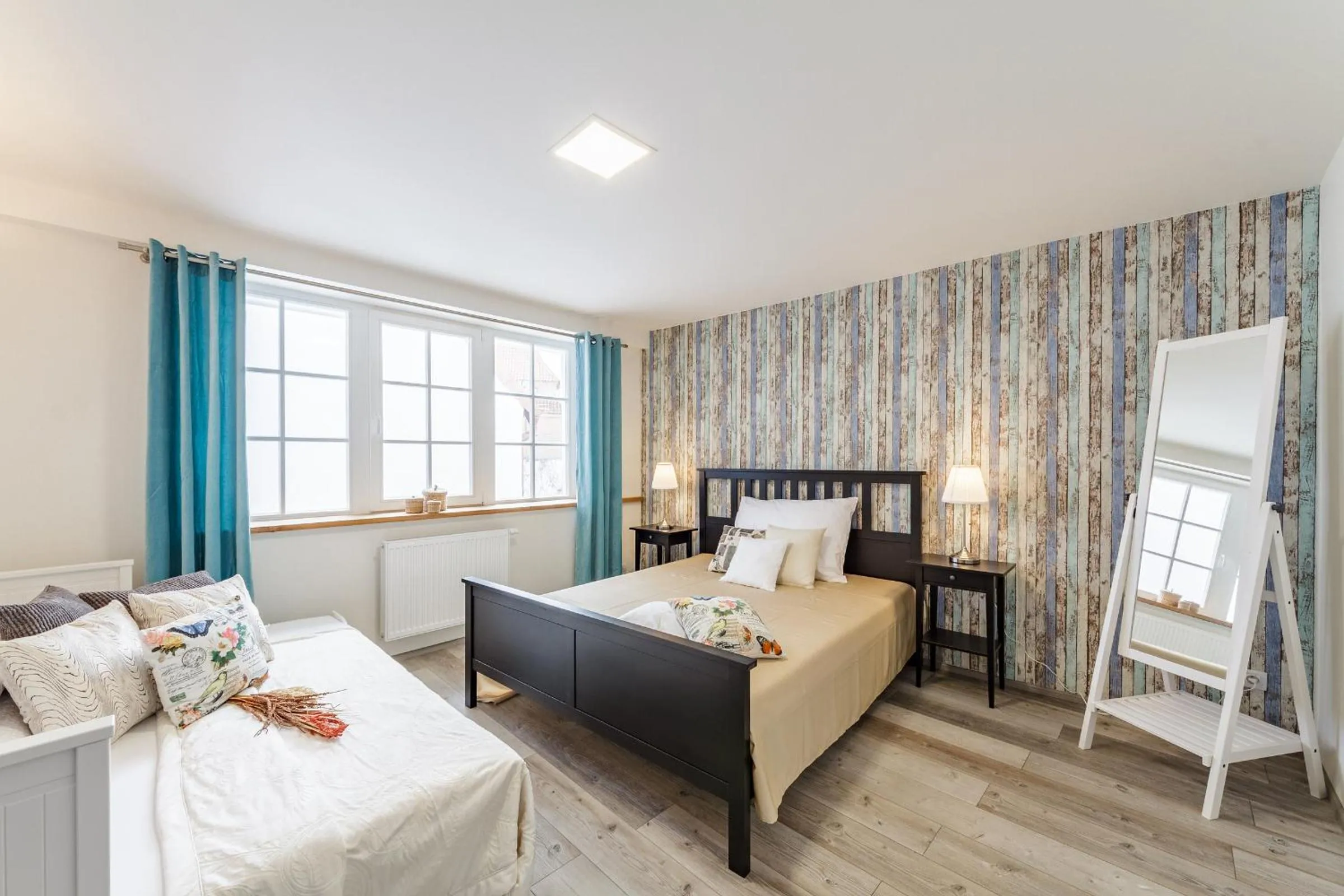 Bed in Downtown Royal Apartments