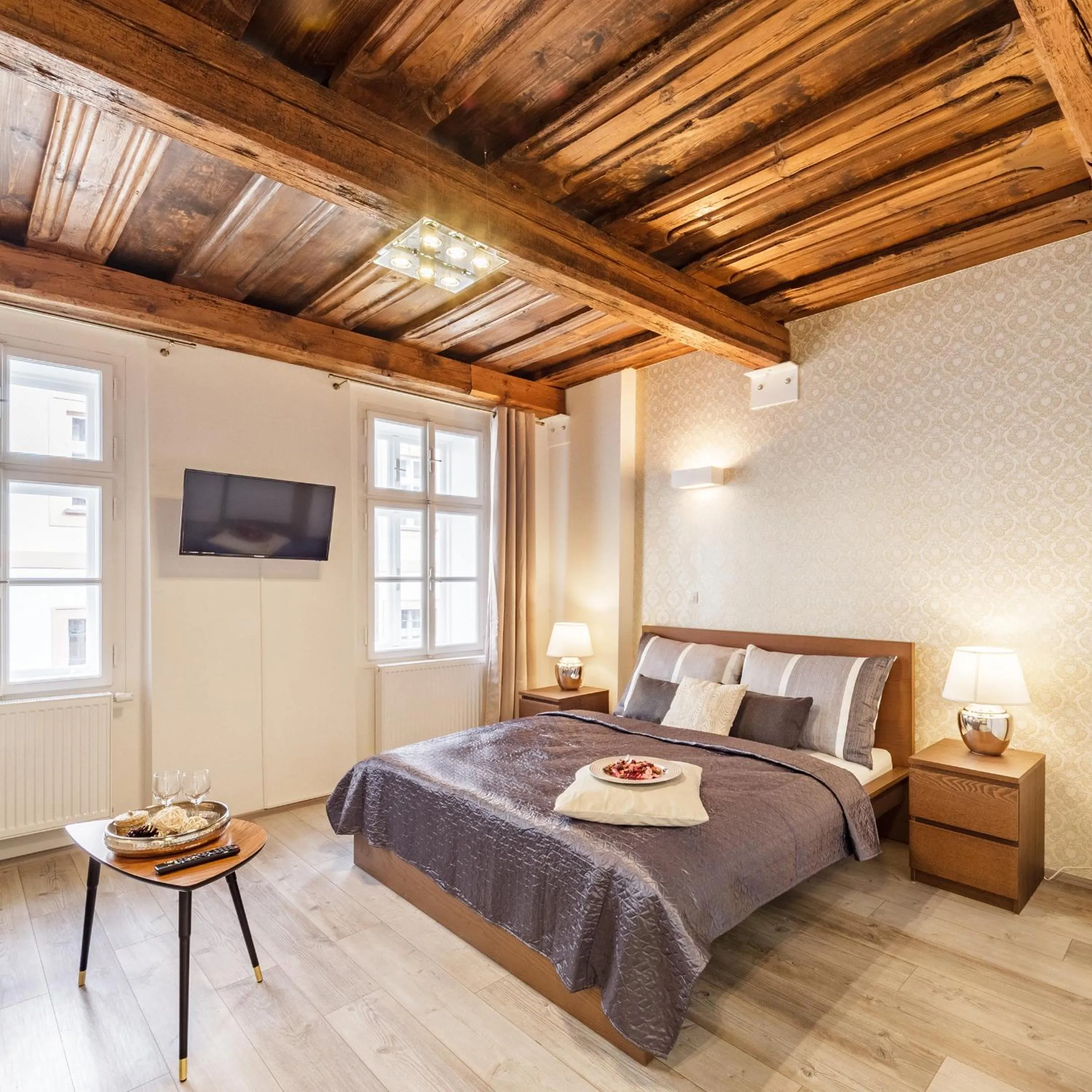 Bed in Downtown Royal Apartments