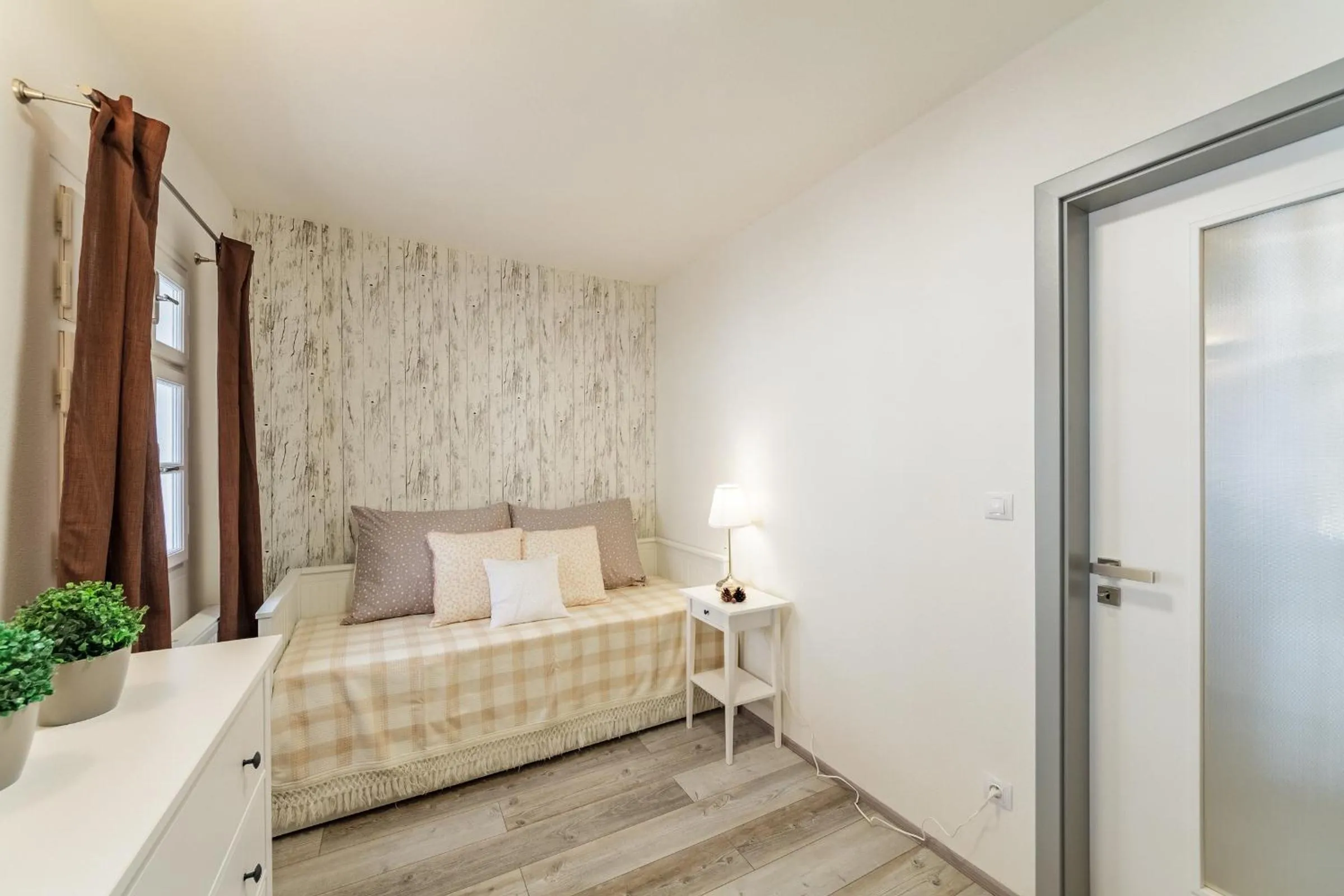 Bed in Downtown Royal Apartments