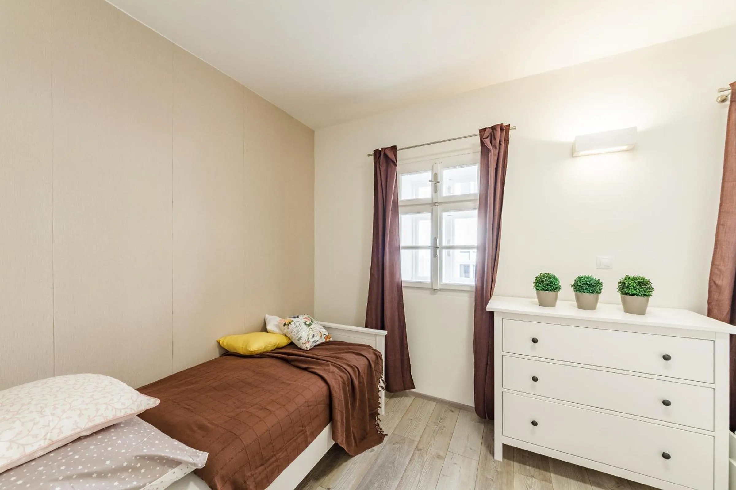 Bed in Downtown Royal Apartments