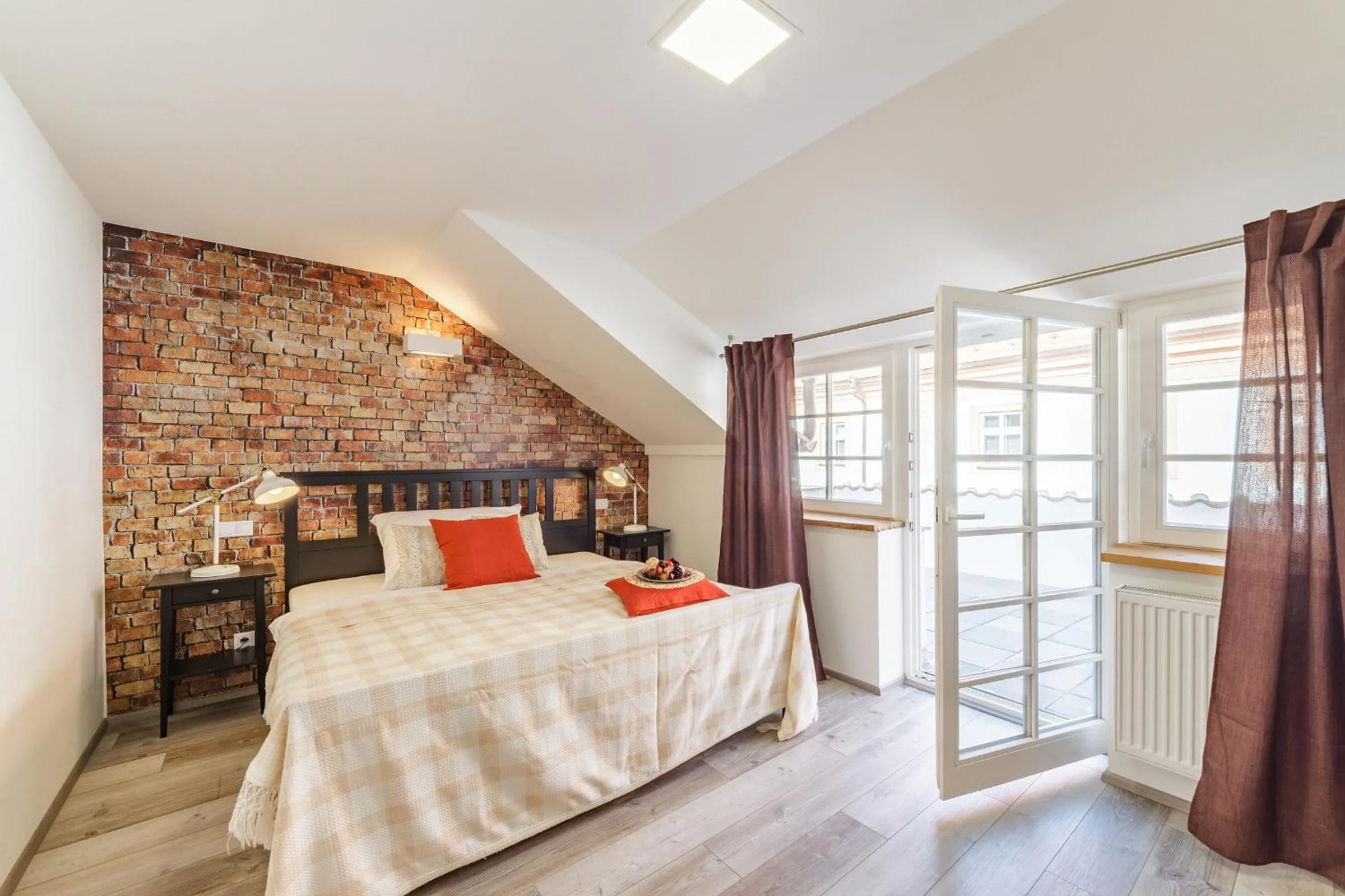 Bed in Downtown Royal Apartments