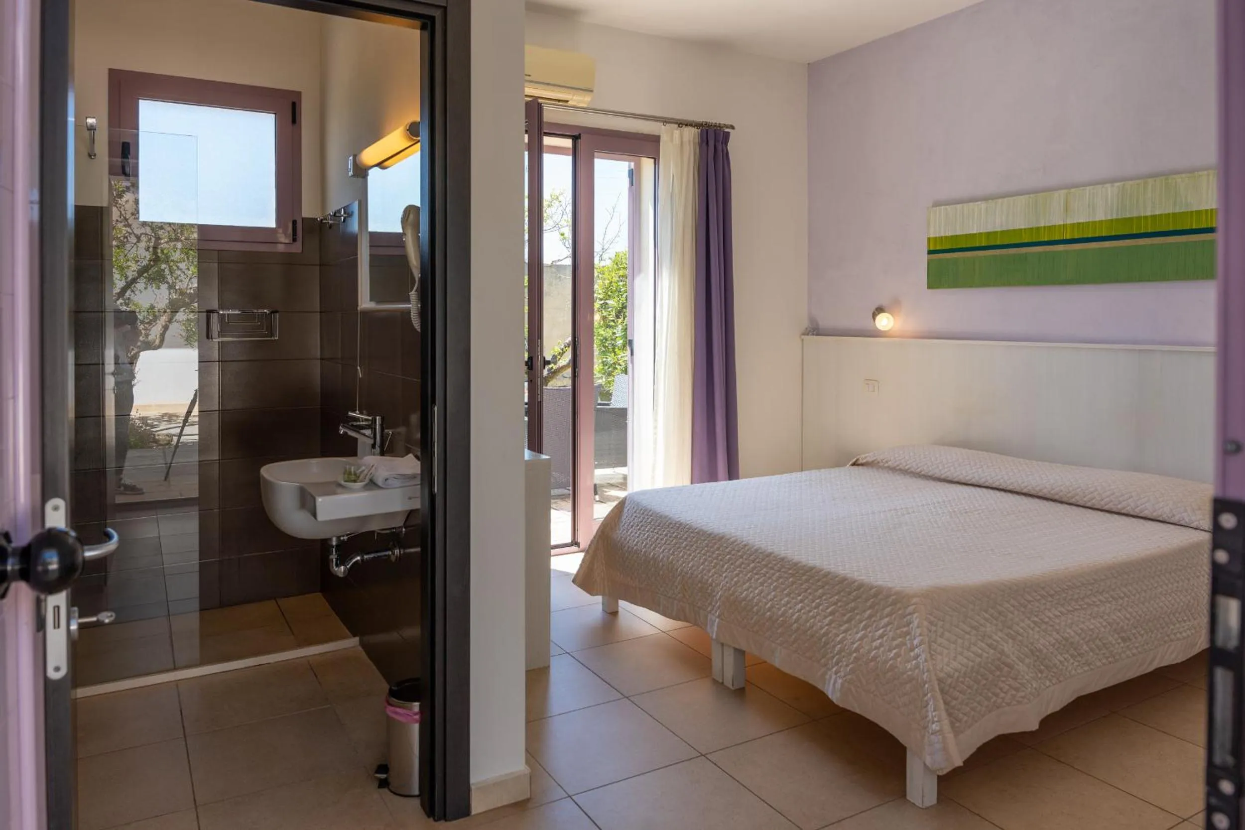 Bedroom, Bed in Corte dei Melograni Hotel Resort