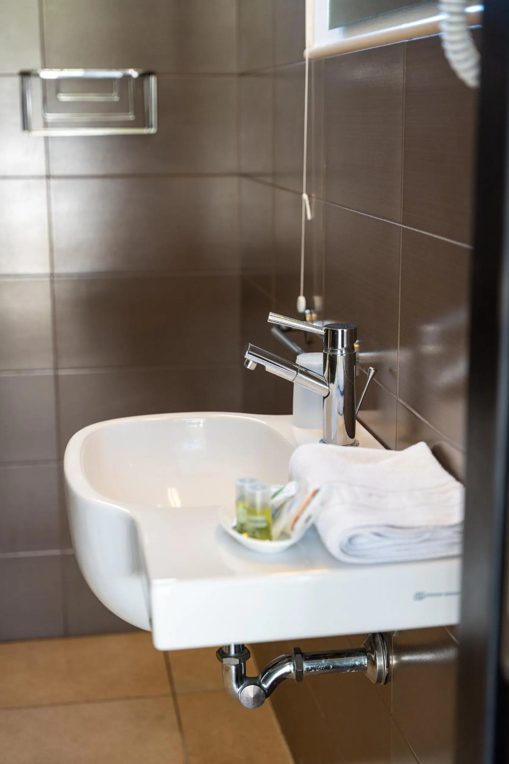 Bathroom in Corte dei Melograni Hotel Resort
