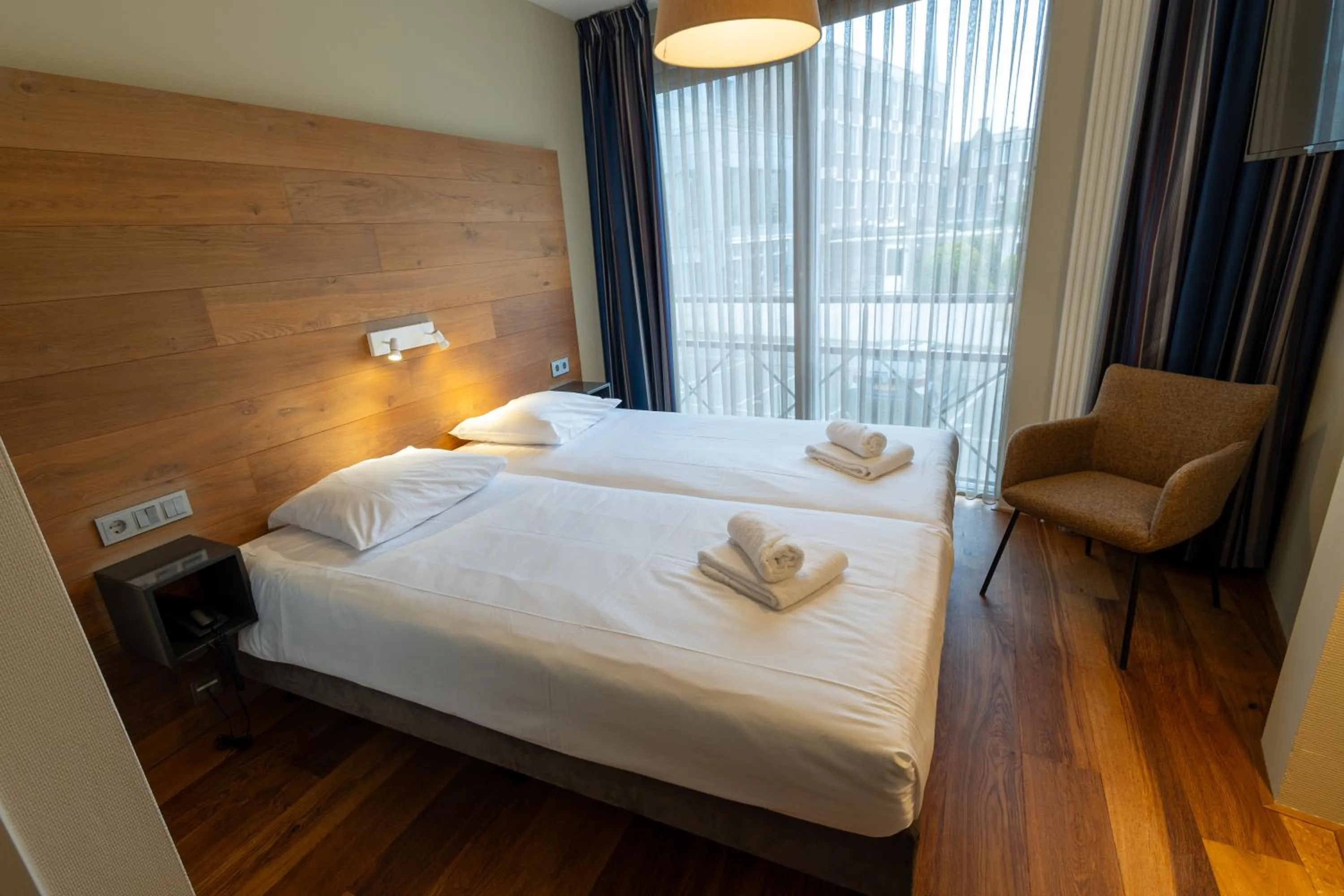 Bed in Stadshotel Doesburg