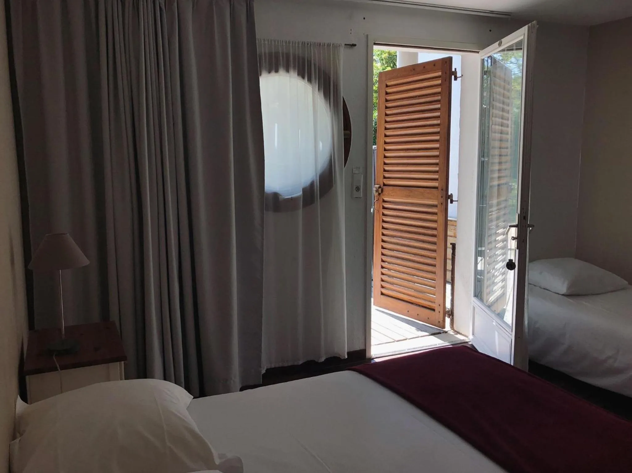 Bed in Le Pavillon Bleu