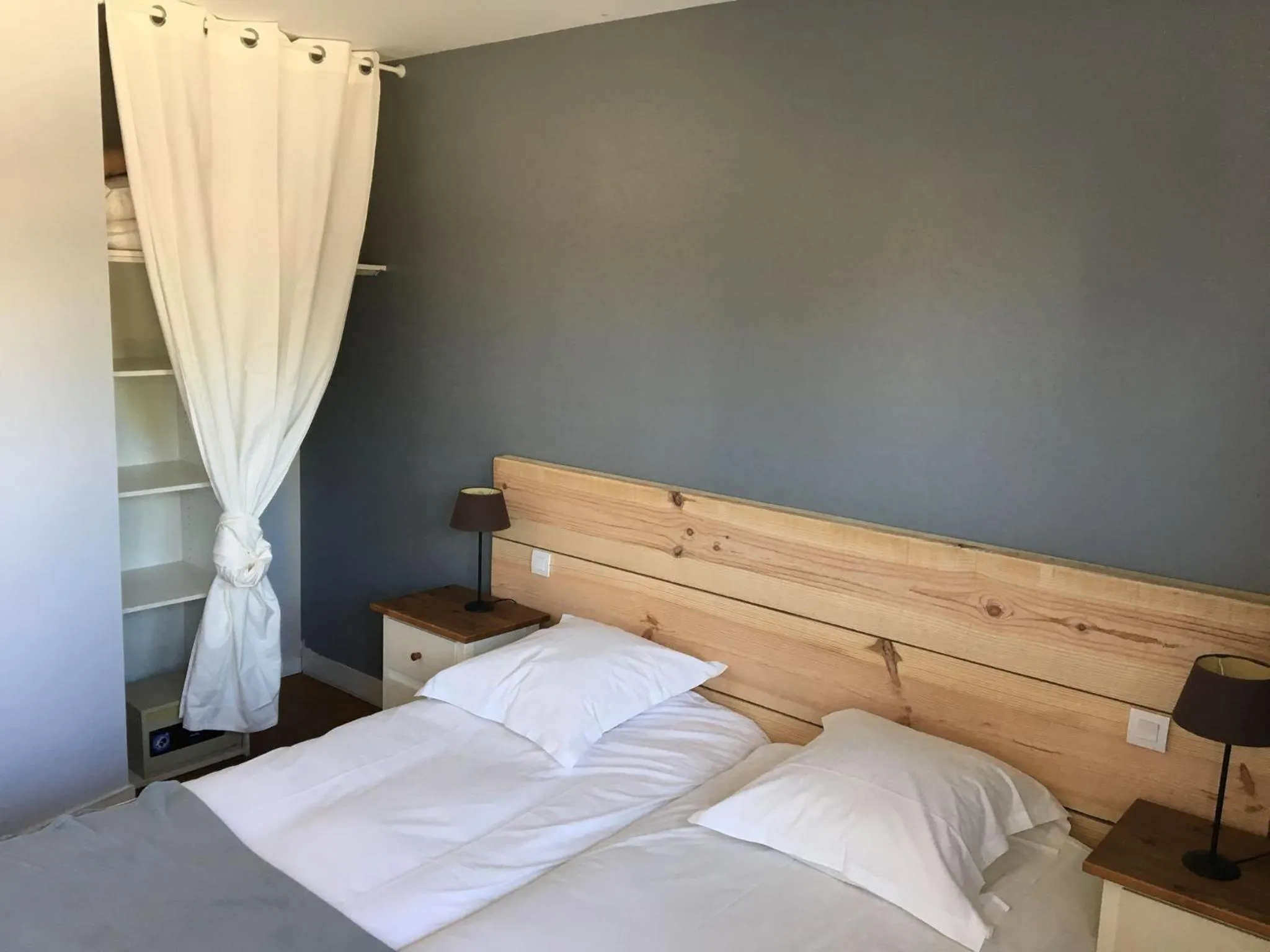 Bed in Le Pavillon Bleu