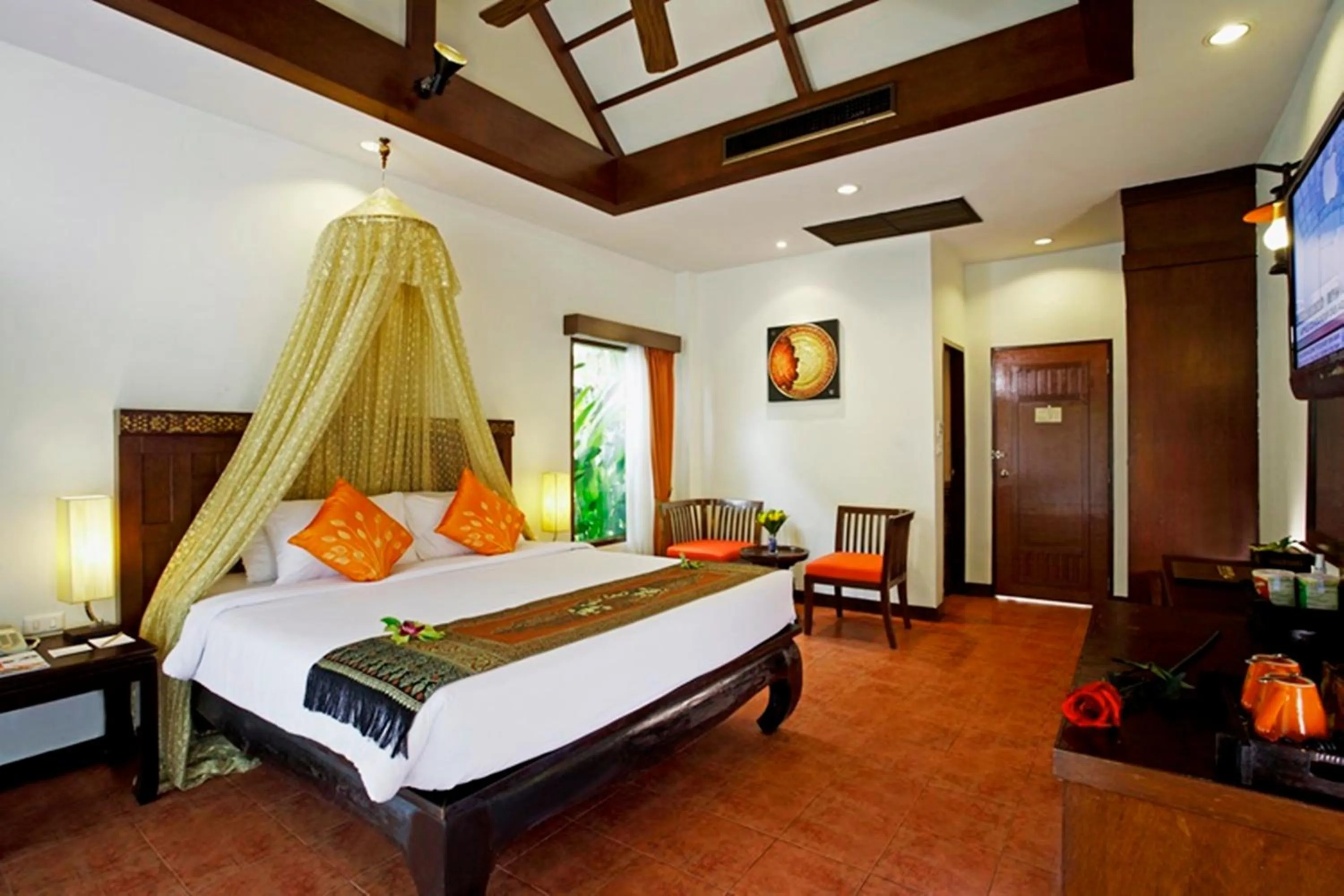 Bed in Diamond Cottage Resort & Spa