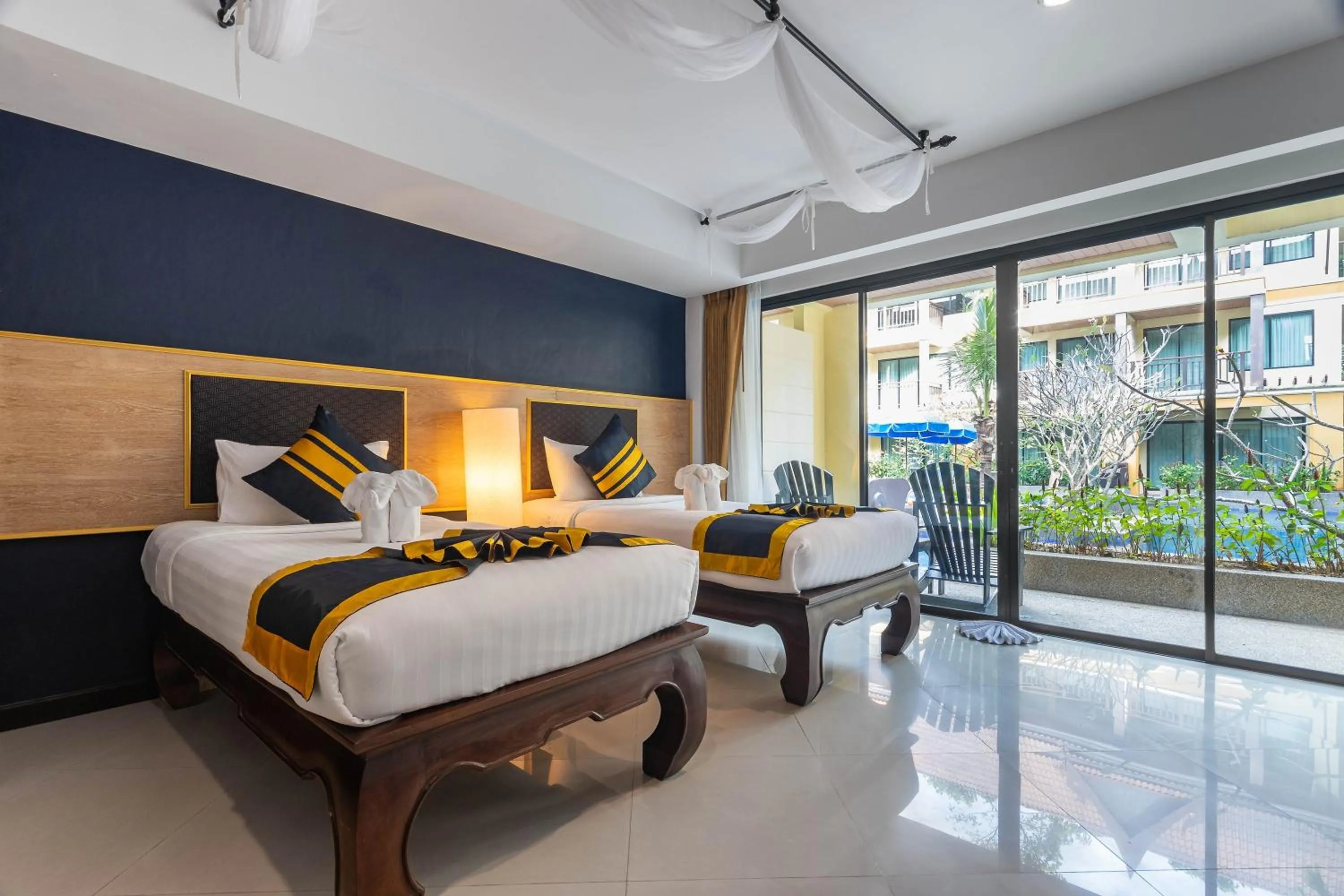 Bed in Diamond Cottage Resort & Spa