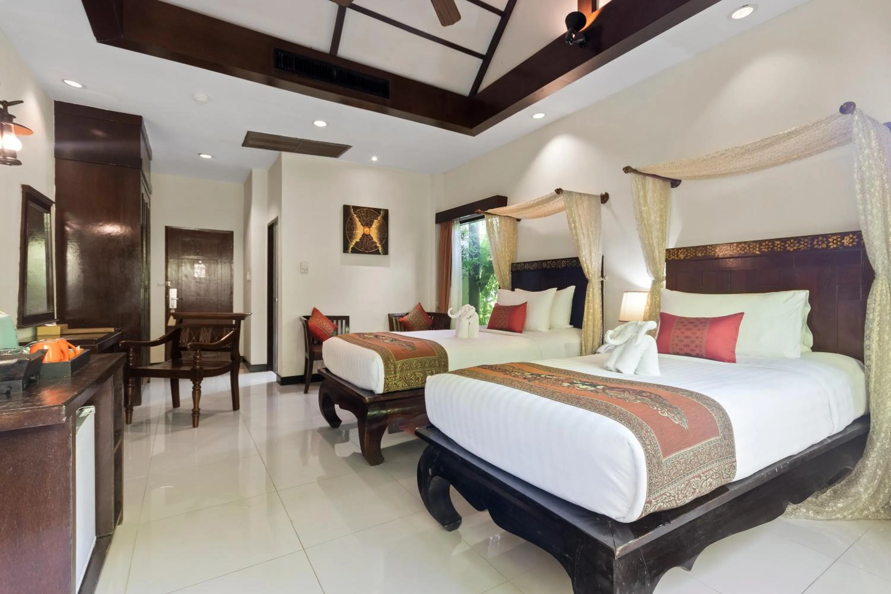 Bed in Diamond Cottage Resort & Spa