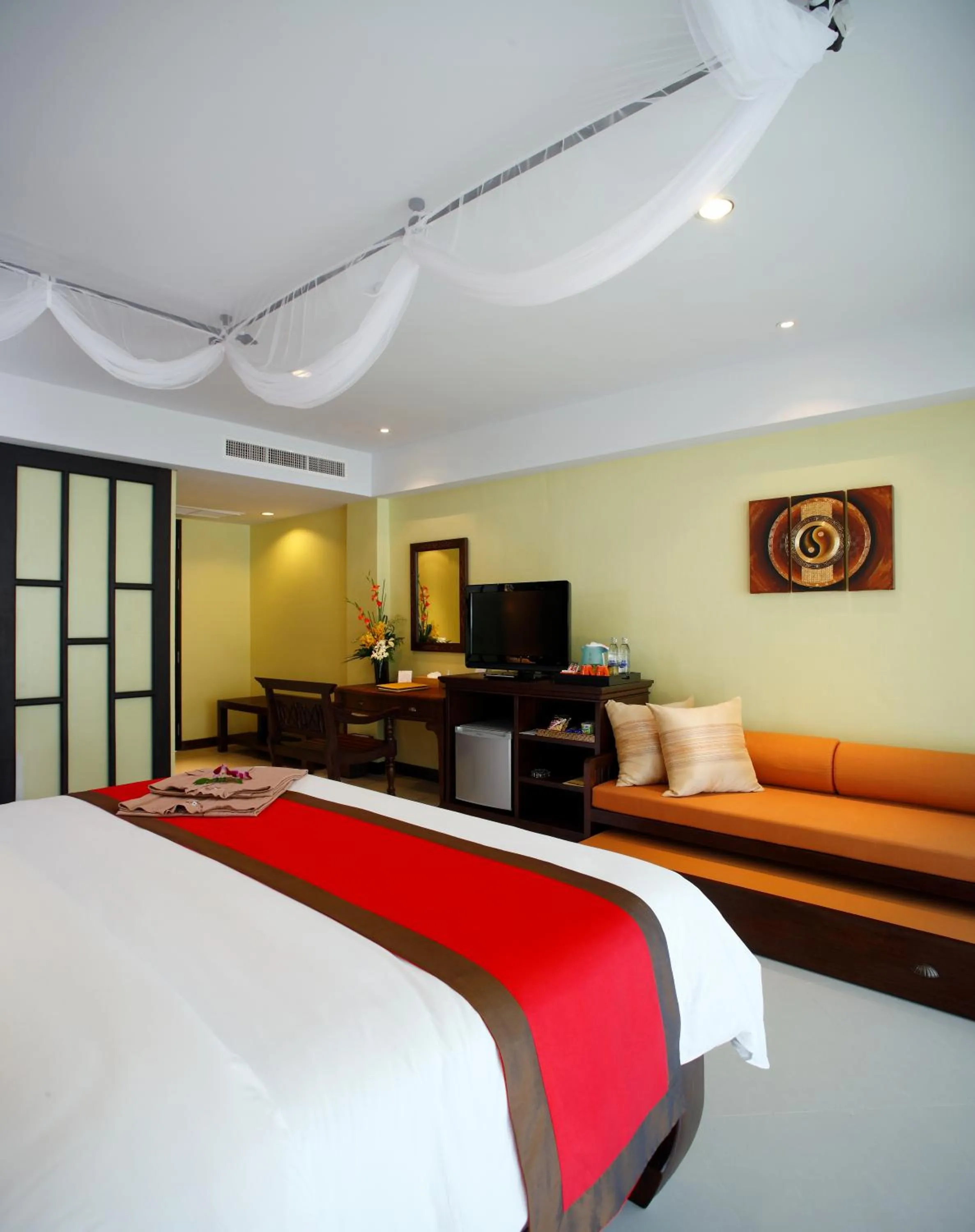 Bed in Diamond Cottage Resort & Spa