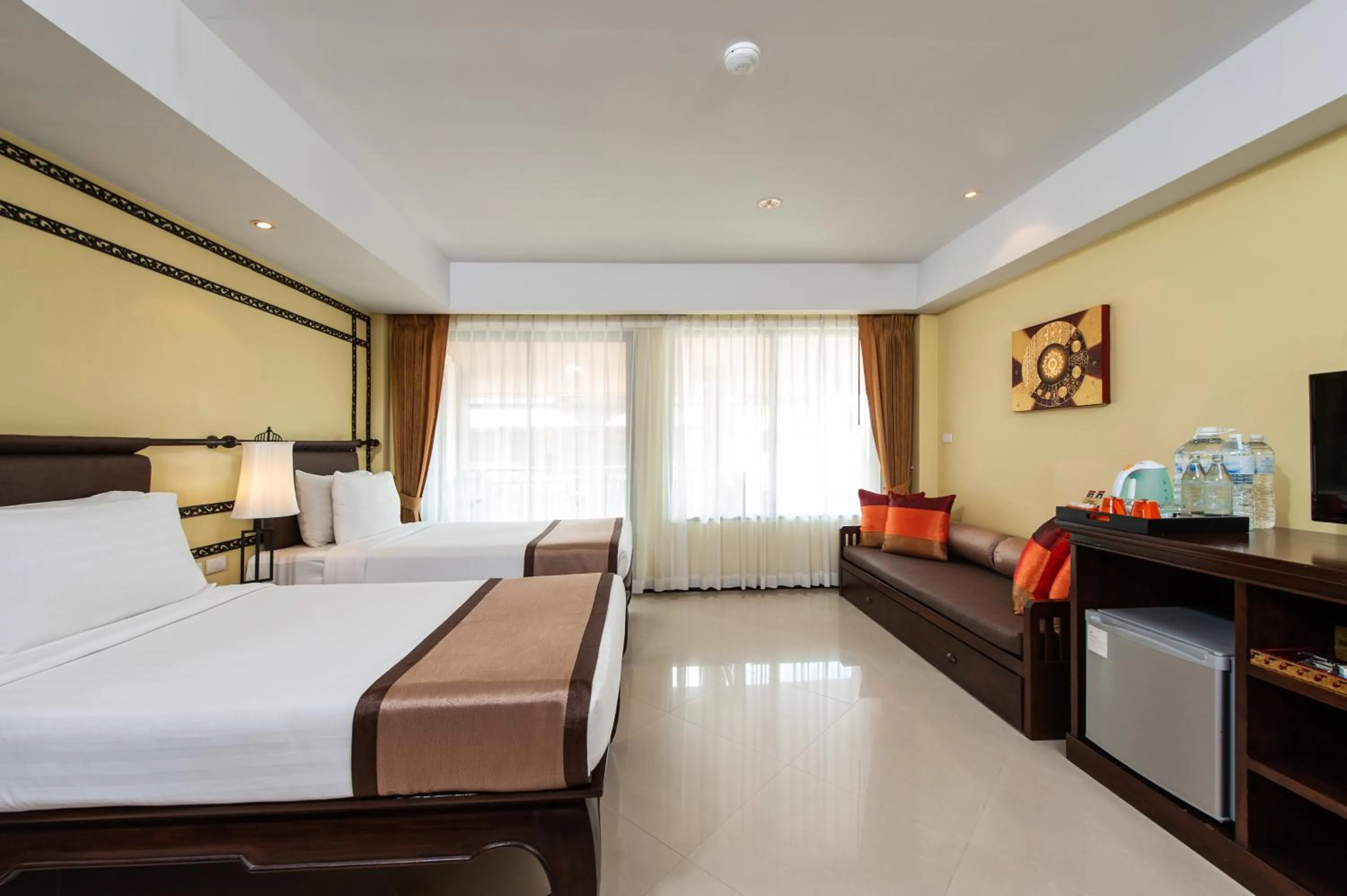 Bed in Diamond Cottage Resort & Spa