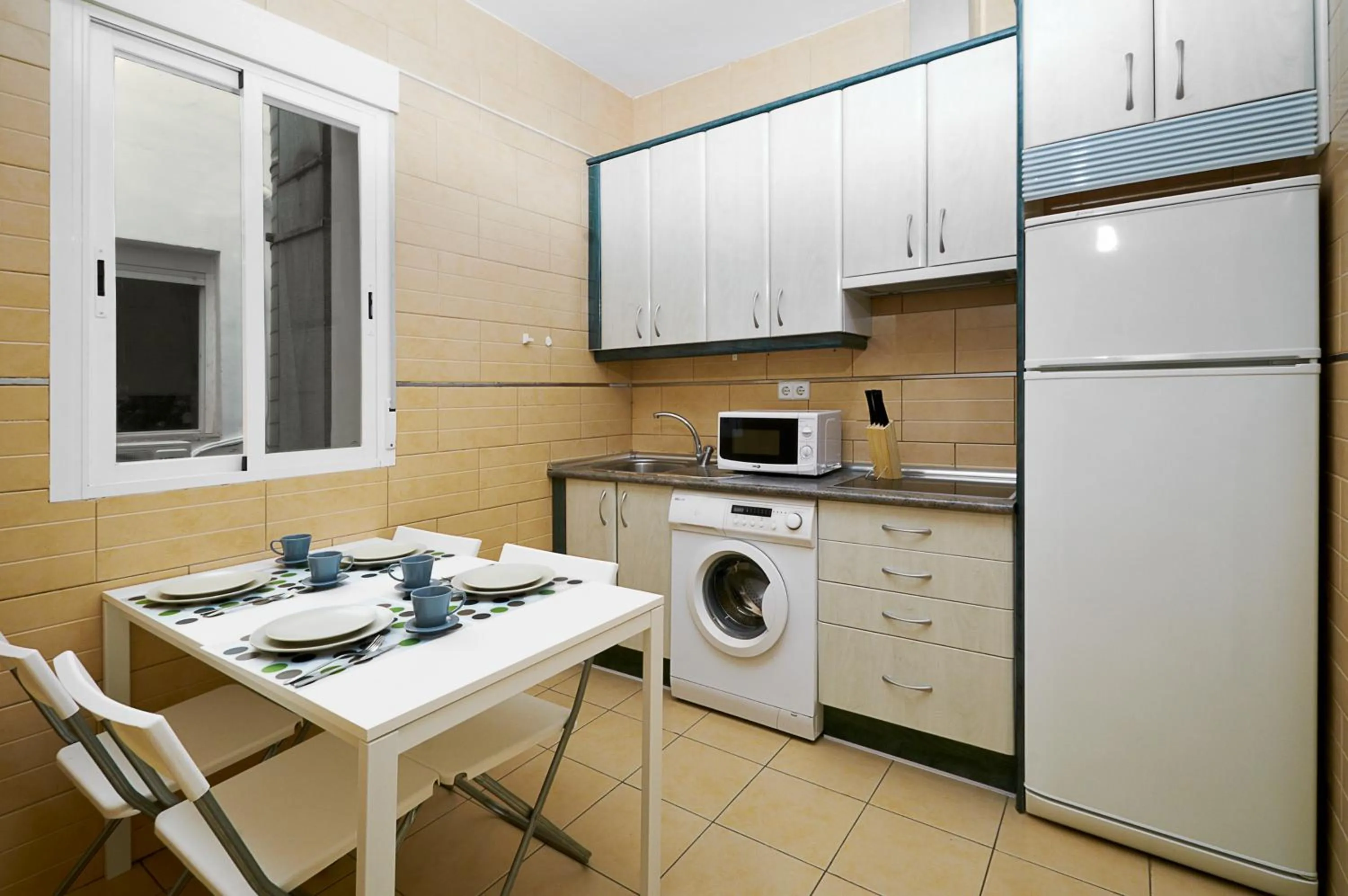 Kitchen or kitchenette in SUITES YOU Zinc