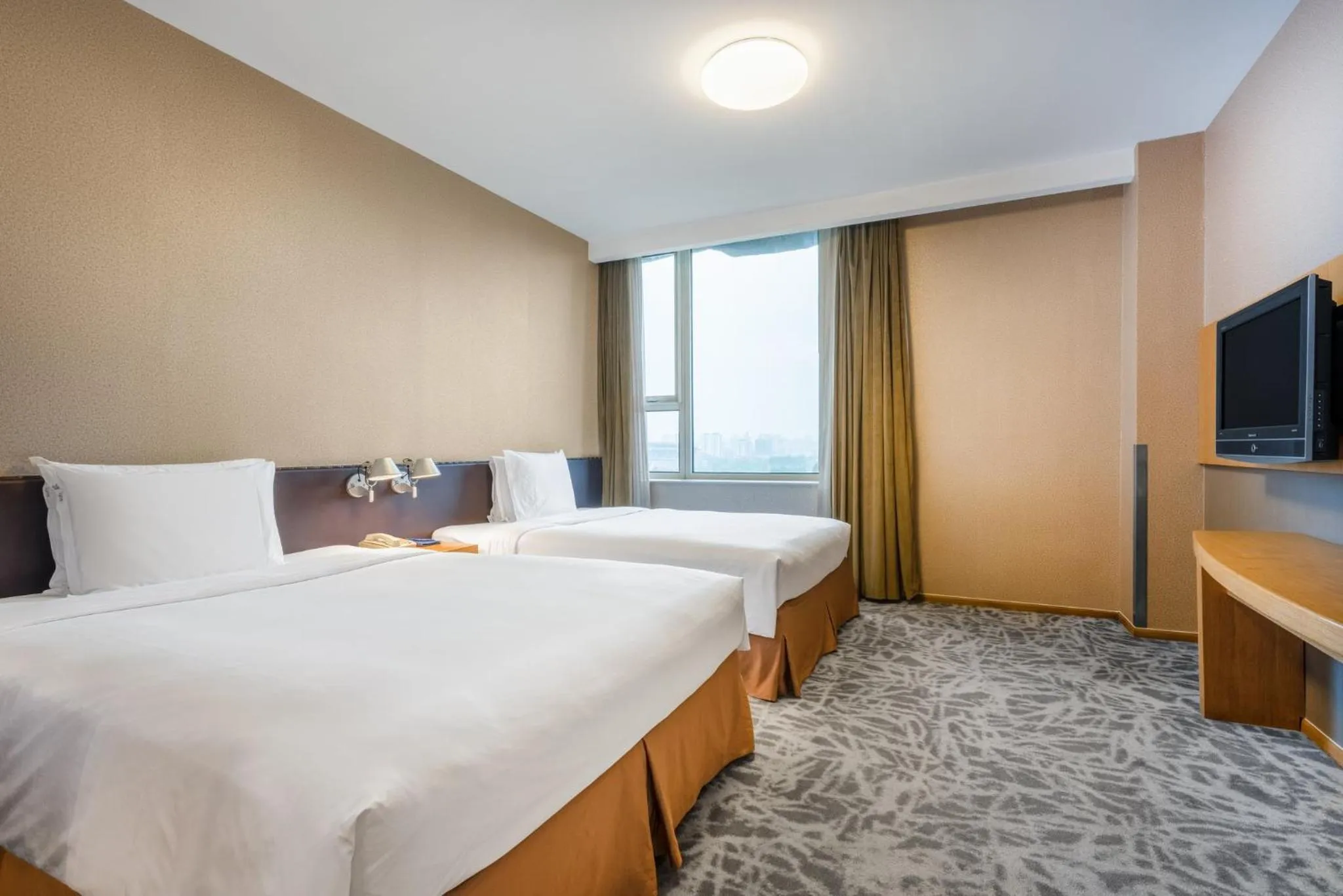 Photo of the whole room, Bed in LeafIN Hotel Beijing Minzuyuan l Bird's Nest