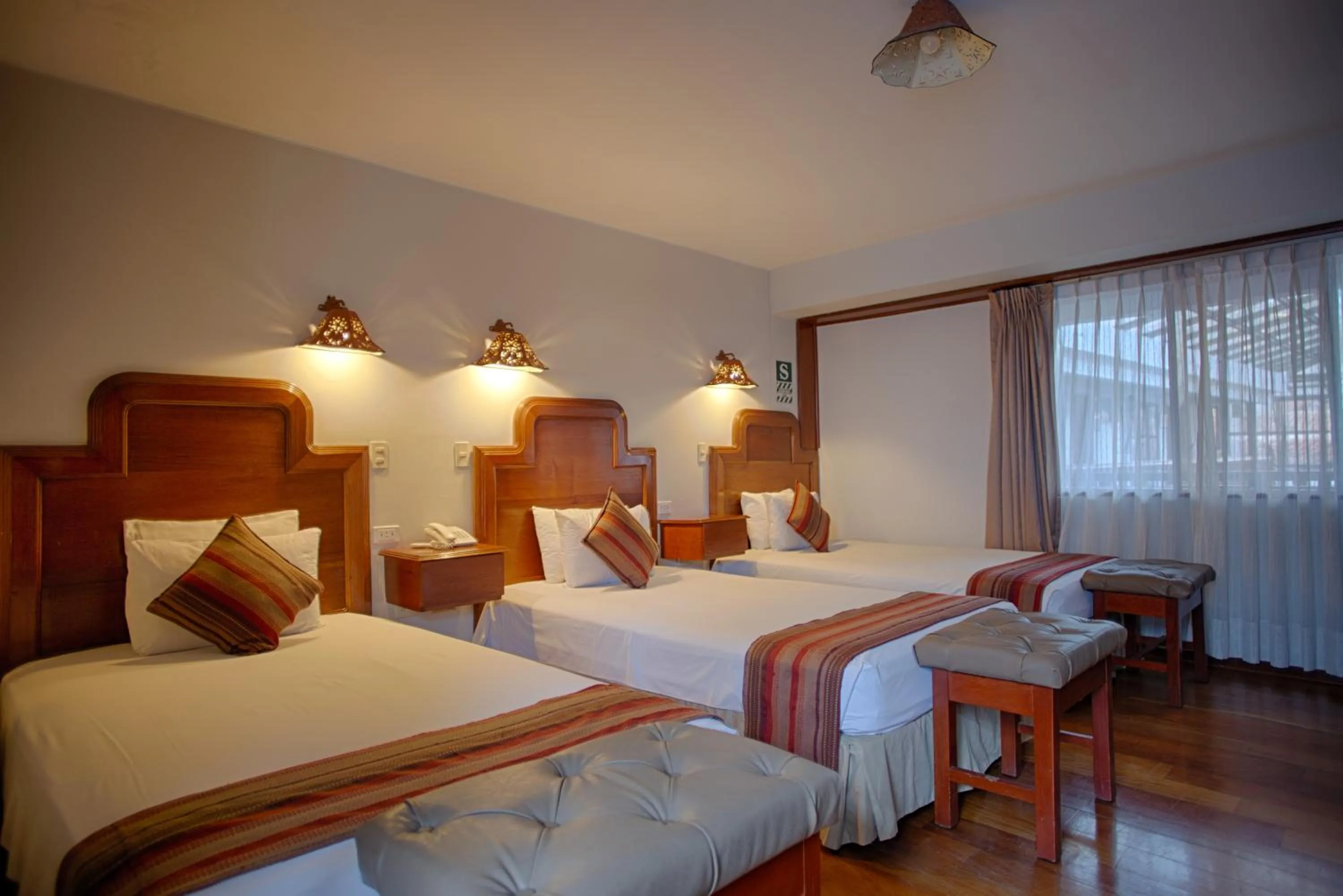 Bed in Munay Wasi Inn