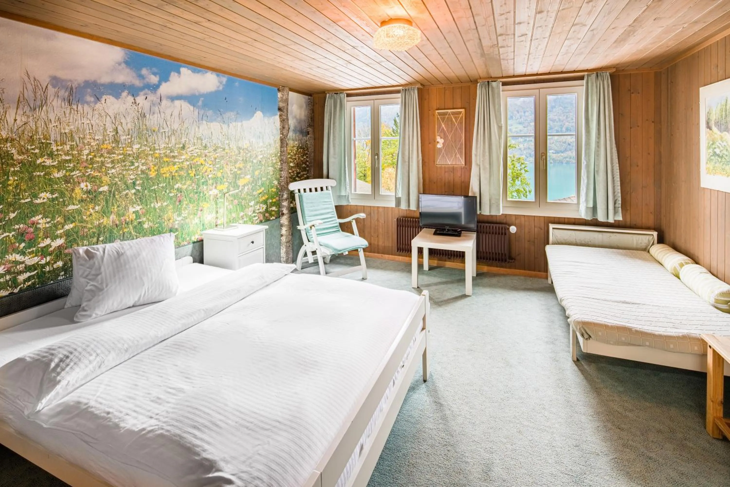 Photo of the whole room, Bed in Hotel Lindenhof by Crossworld AG