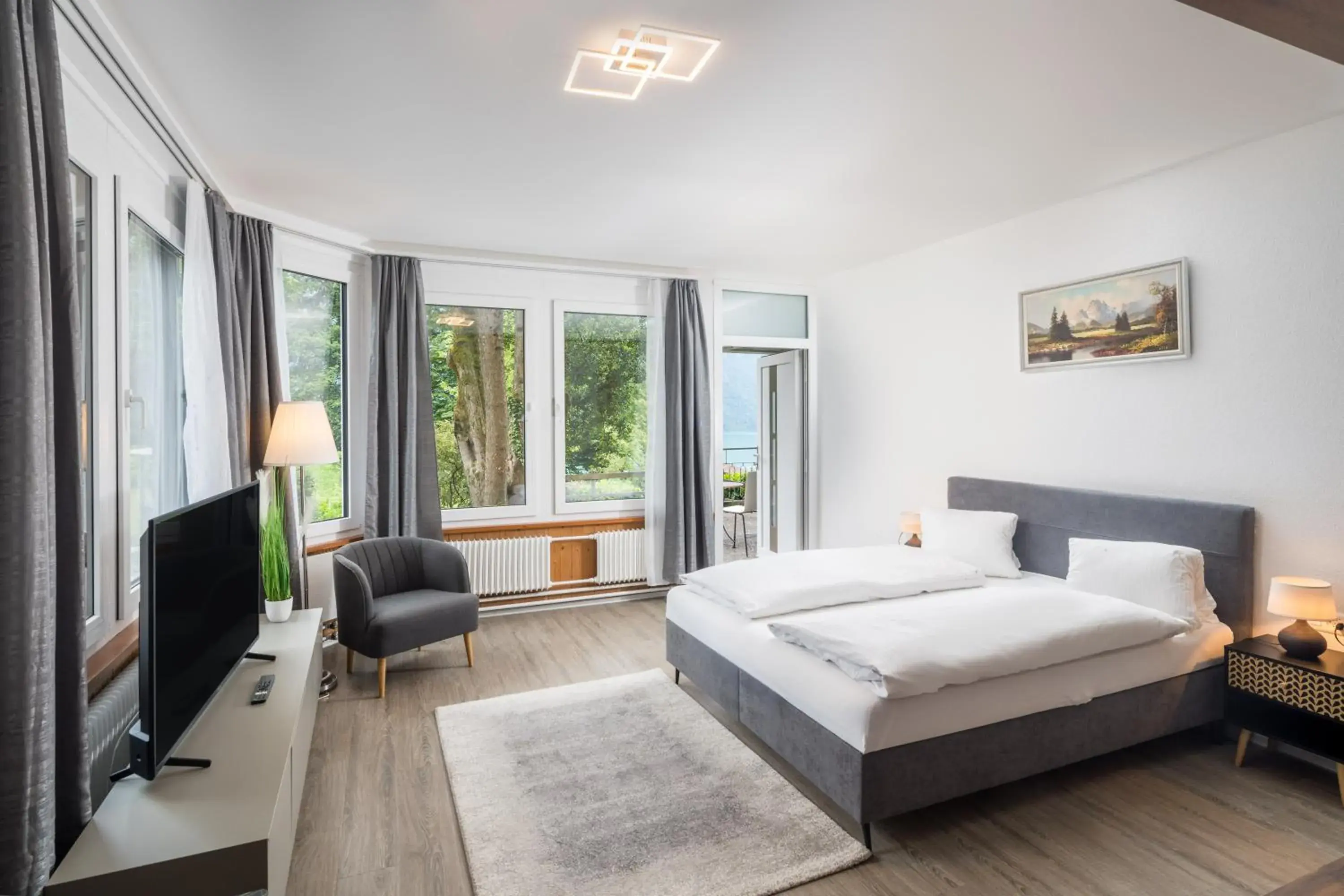 Deluxe Apartment with Partial Lake View in Hotel Lindenhof by Crossworld AG Deluxe Apartment with Partial Lake View in Hotel Lindenhof by Crossworld AG