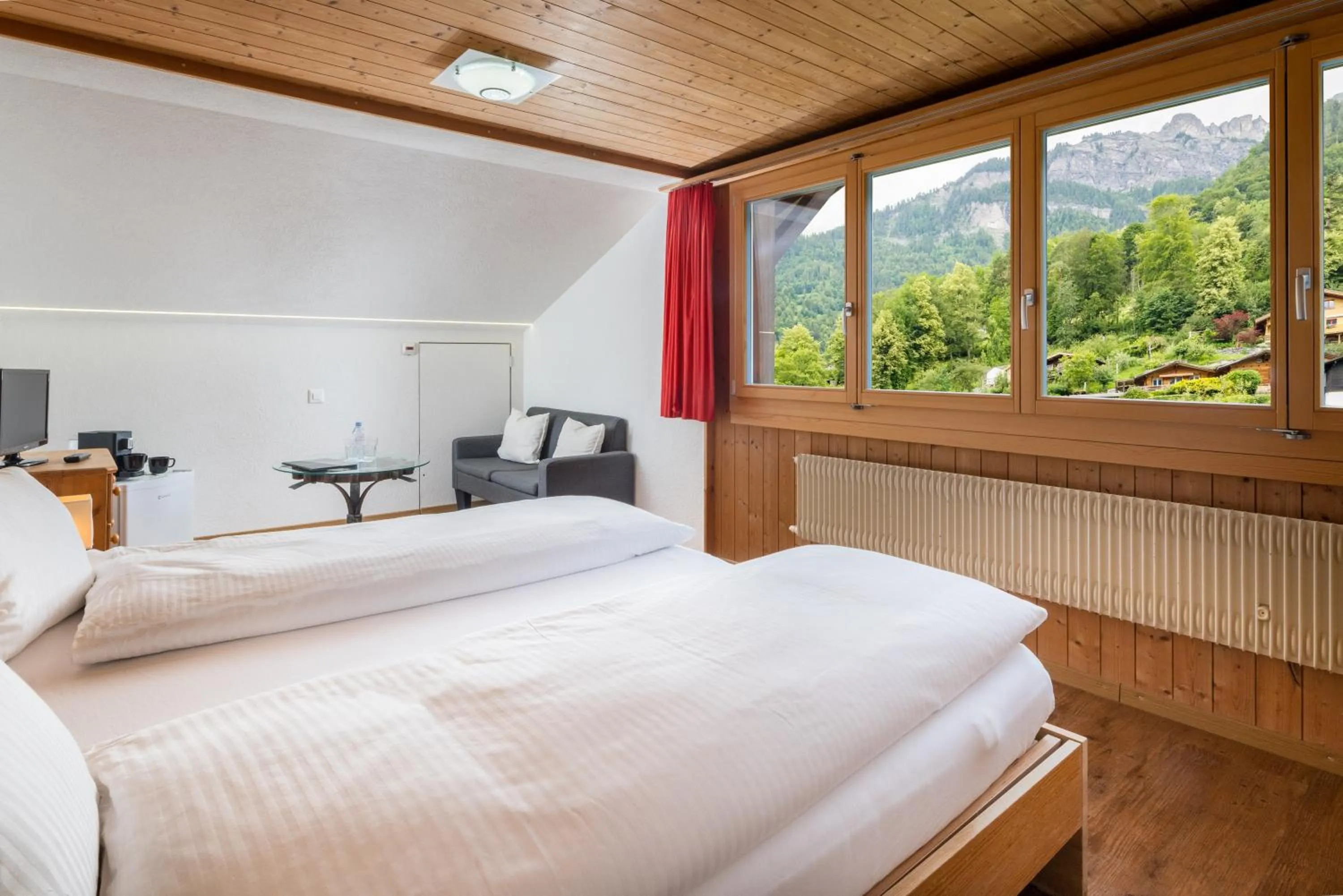 Bed in Hotel Lindenhof by Crossworld AG