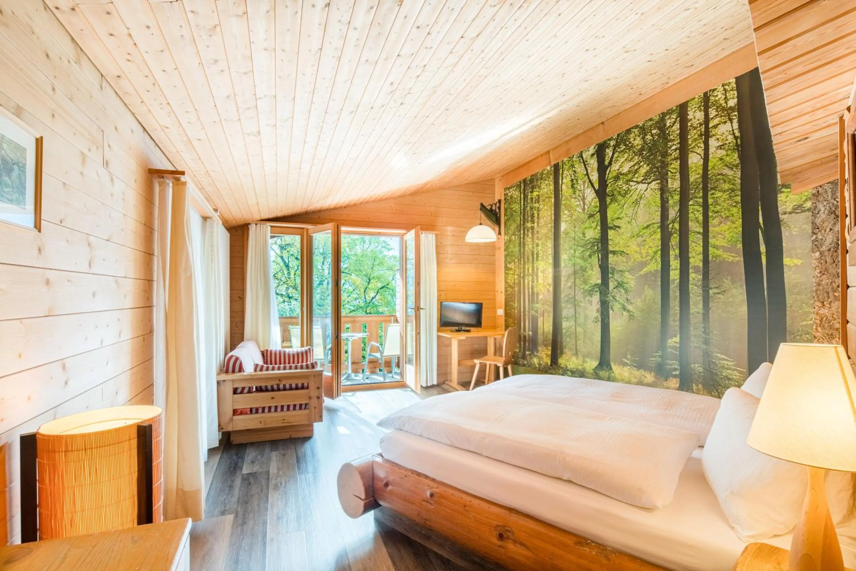 Photo of the whole room, Bed in Hotel Lindenhof by Crossworld AG