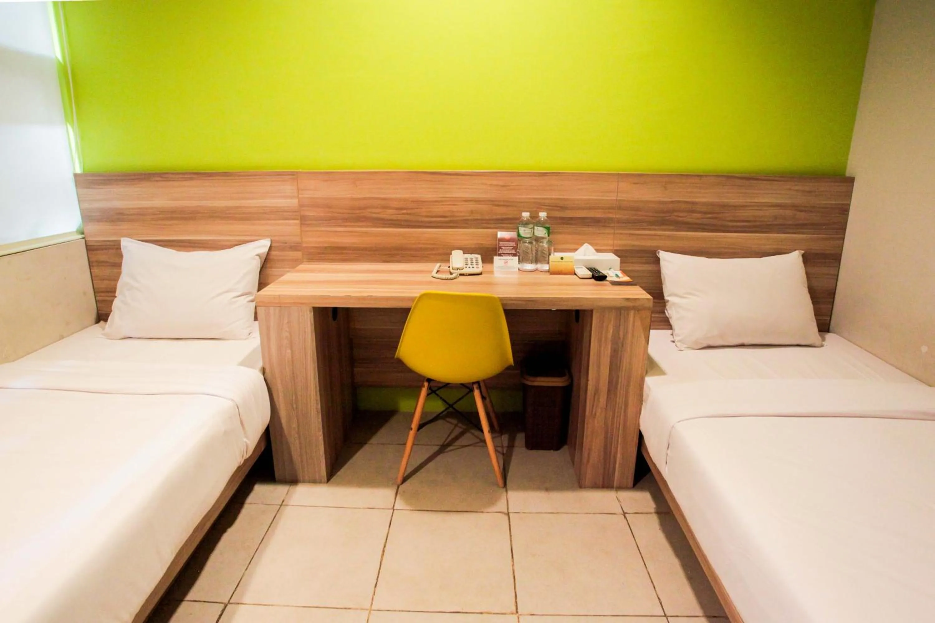 Bed in LeGreen Suite Supomo