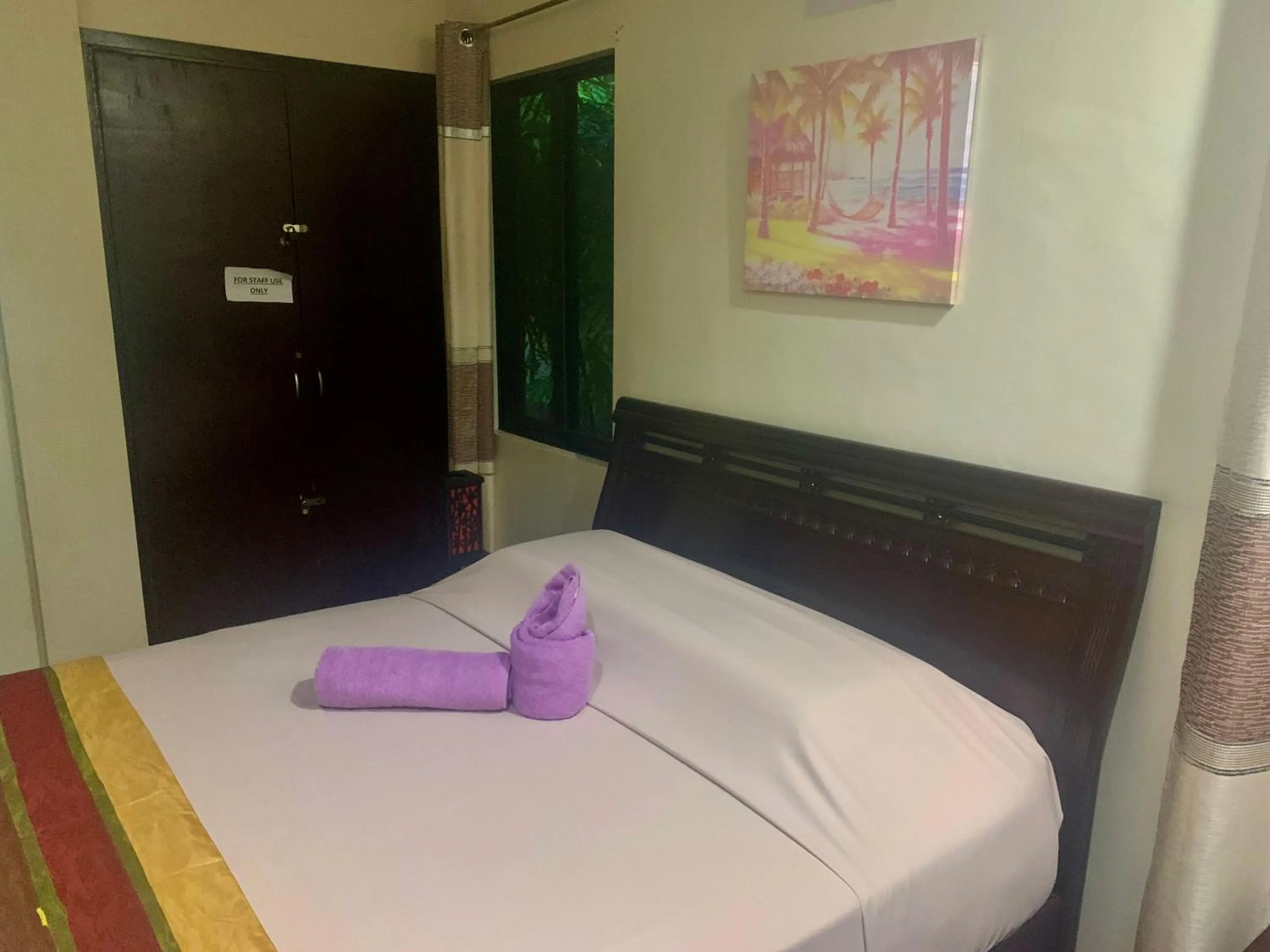 Bed in Adayo Cove Resort