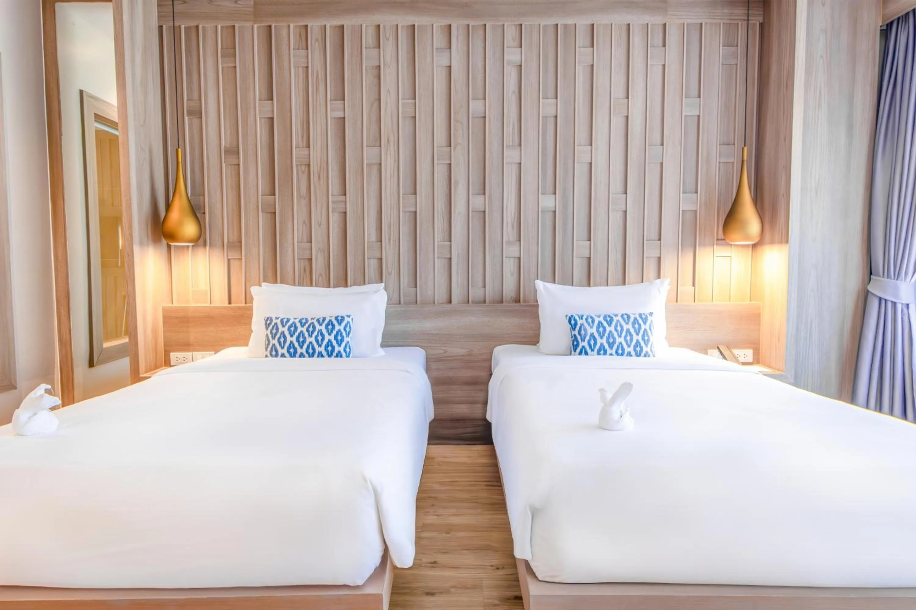 Bed in Namaka Resort Kamala