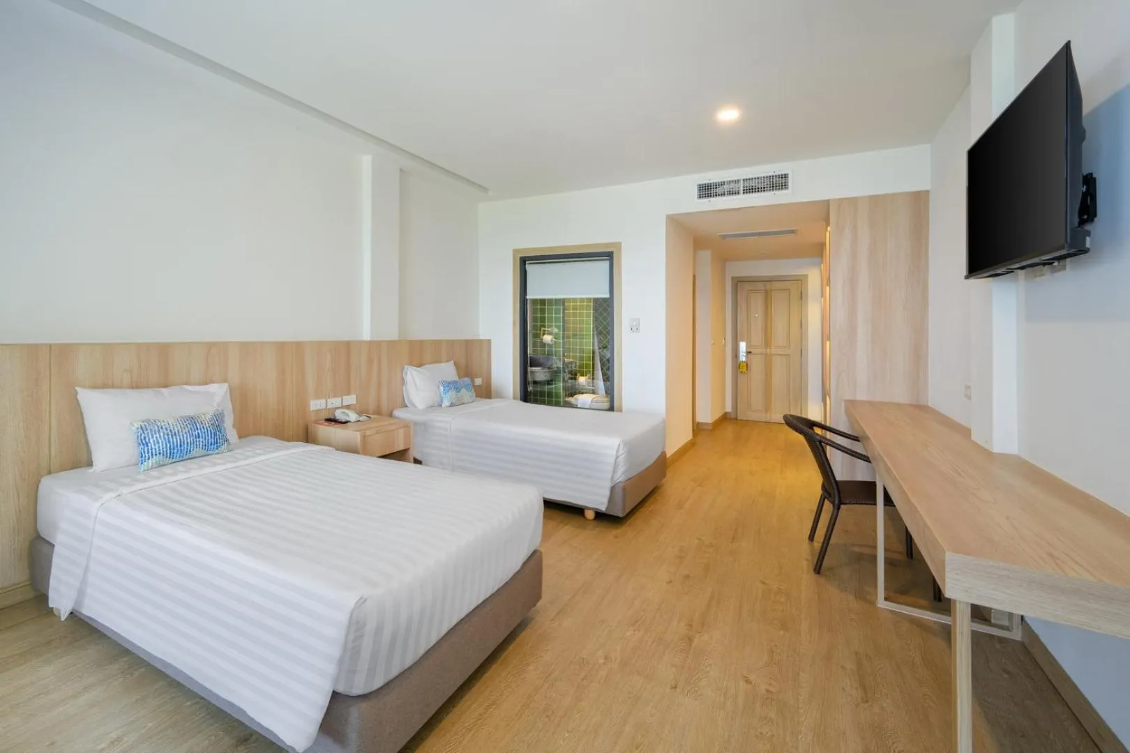 Bed in Namaka Resort Kamala